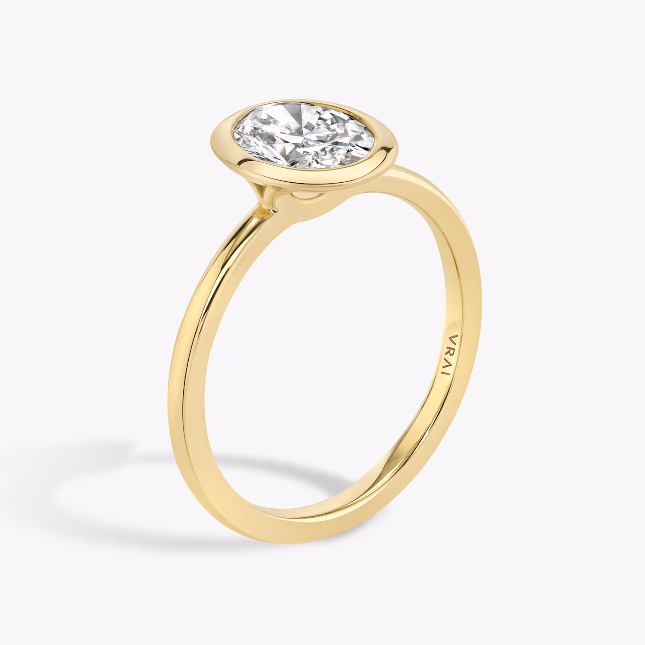 The Signature Bezel | Oval | 18k | Yellow Gold | bandAccent: Plain | diamondOrientation: vertical | caratWeight: other