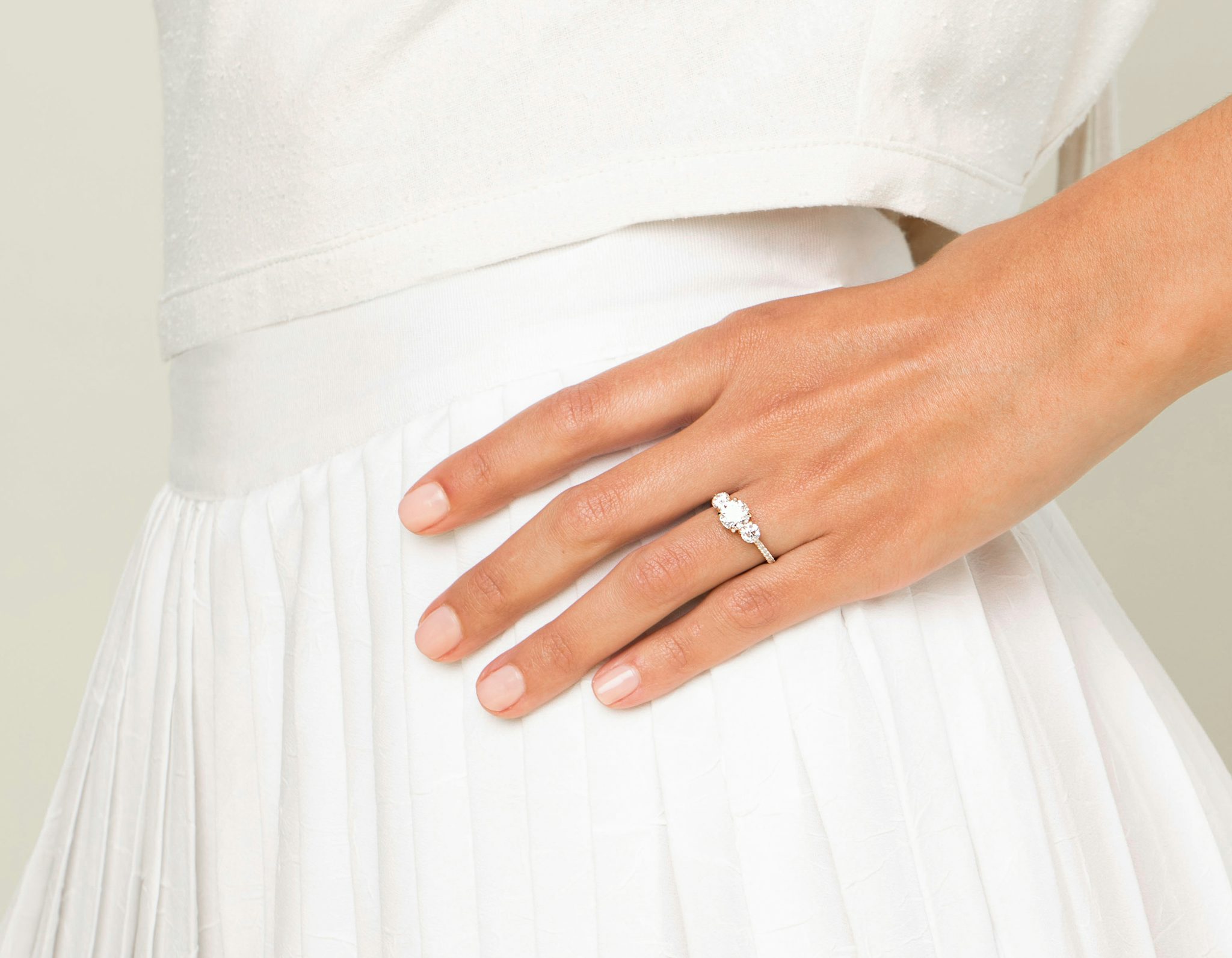 The Three Stone | Round Brilliant | 18k | Yellow Gold | bandAccent: Pavé | caratWeight: other | sideStoneCarat: 0.25ct | sideStoneShape: Round Brilliant | diamondOrientation: vertical