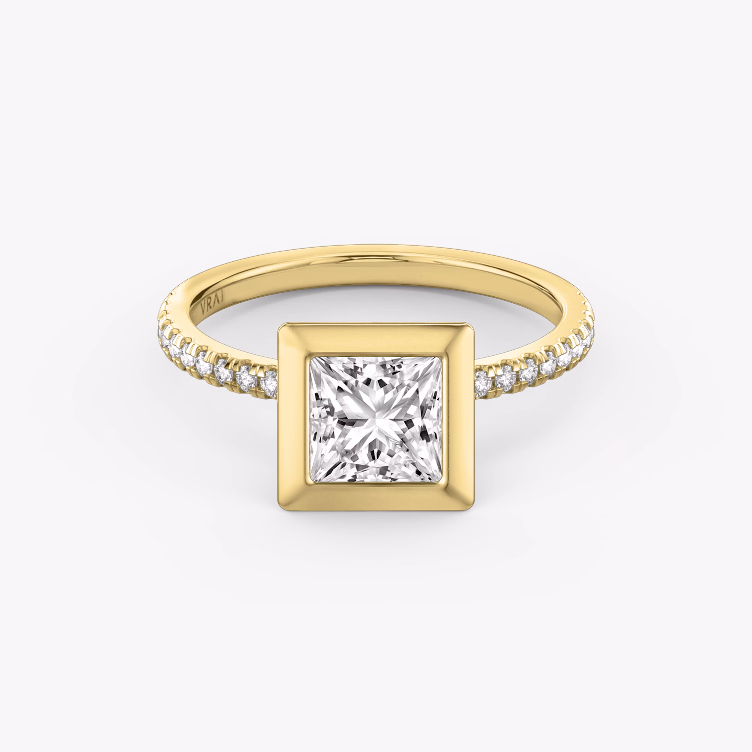 Yellow gold Signature Bezel engagement ring with Princess cut diamond