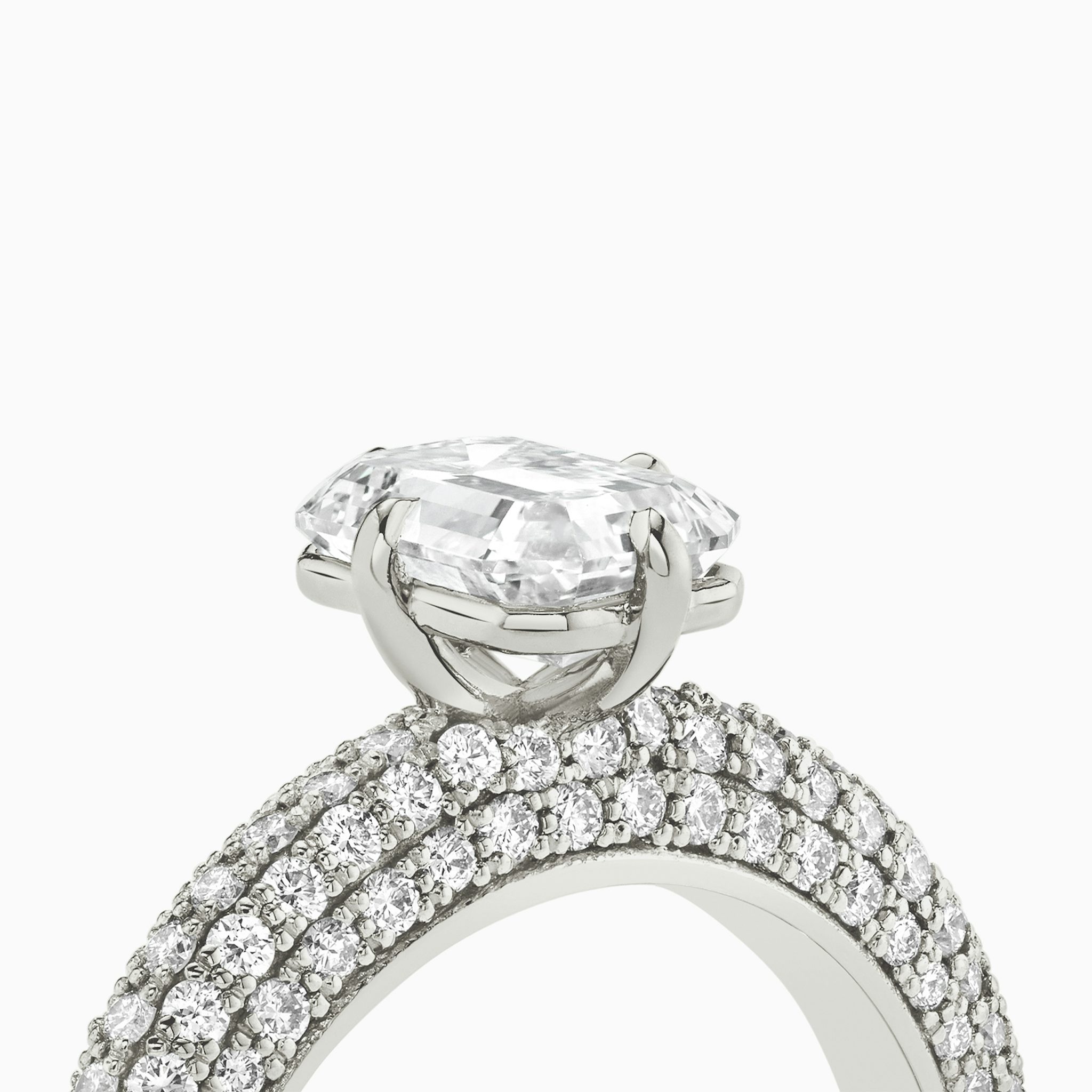 The Curator | Emerald | Platinum | bandAccent: Pavé | diamondOrientation: vertical | caratWeight: other