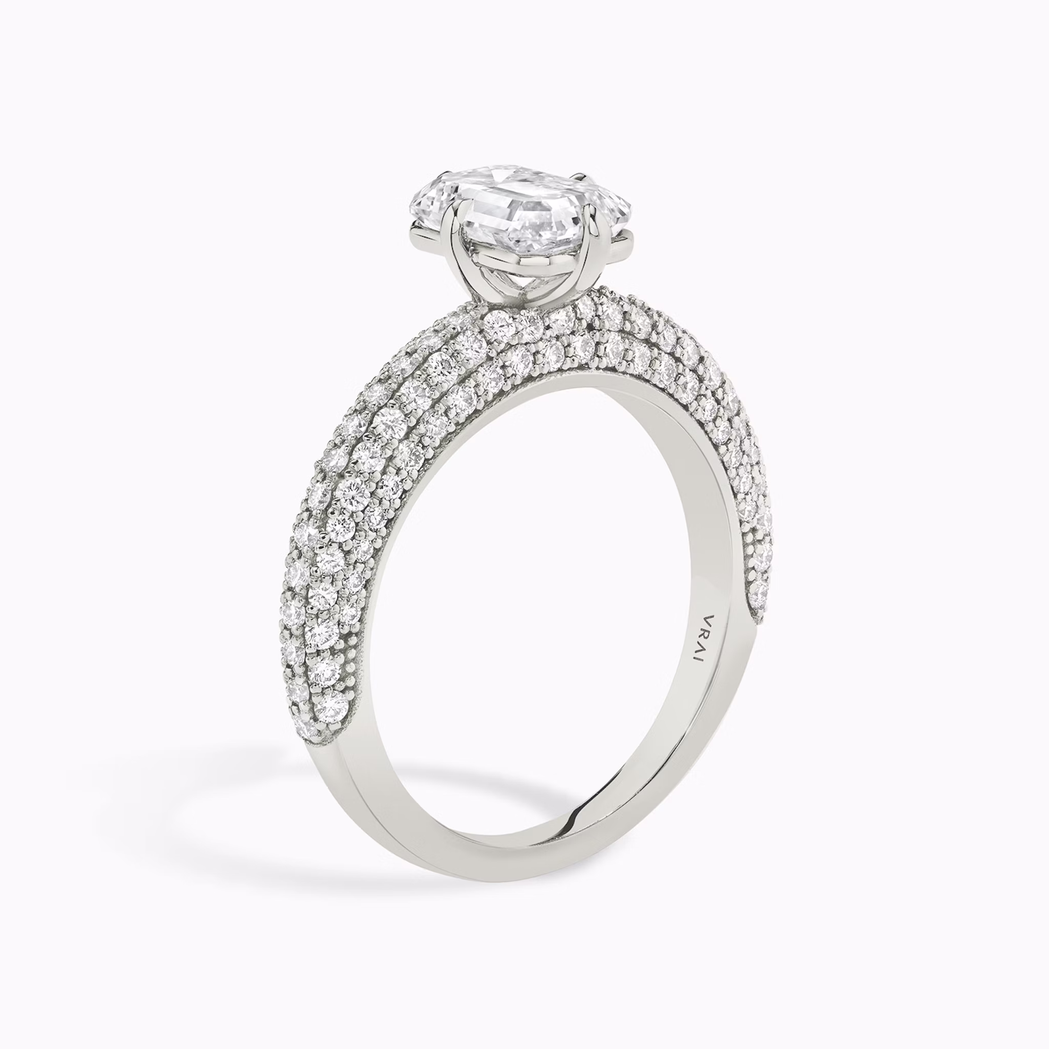 The Curator | Emerald | Platinum | bandAccent: Pavé | diamondOrientation: vertical | caratWeight: other