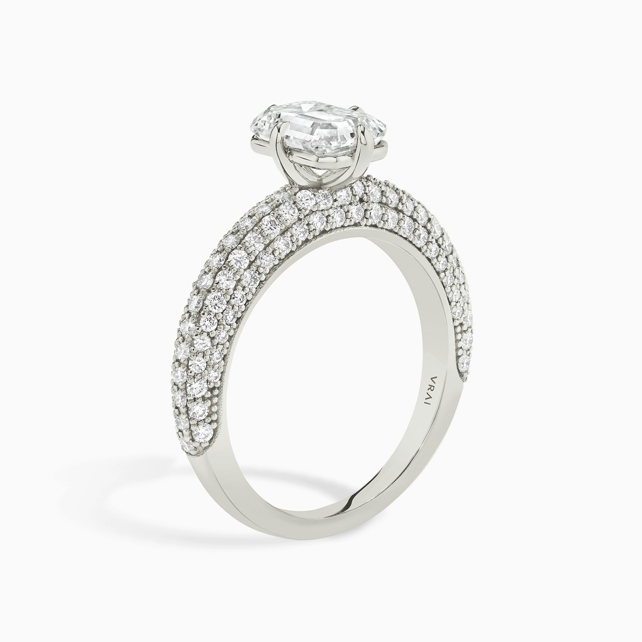 The Curator | Emerald | Platinum | bandAccent: Pavé | diamondOrientation: vertical | caratWeight: other
