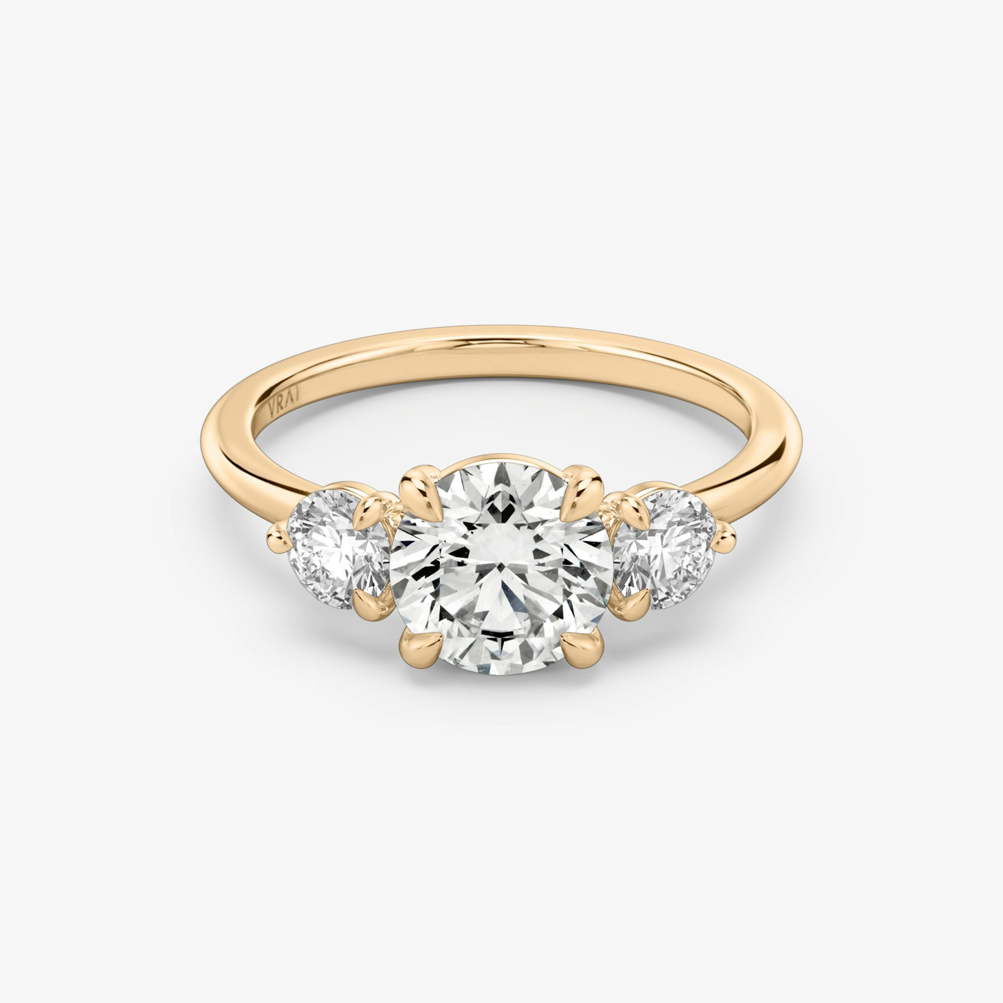 The Three Stone | Round Brilliant | 14k | Rose Gold | bandAccent: Plain | caratWeight: other | sideStoneCarat: 0.25ct | sideStoneShape: Round Brilliant | diamondOrientation: vertical