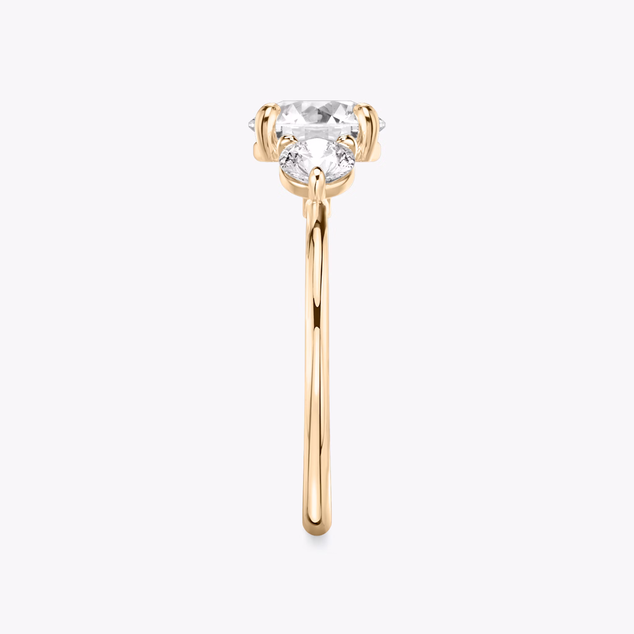 The Three Stone | Round Brilliant | 14k | Rose Gold | bandAccent: Plain | caratWeight: other | sideStoneCarat: 0.25ct | sideStoneShape: Round Brilliant | diamondOrientation: vertical
