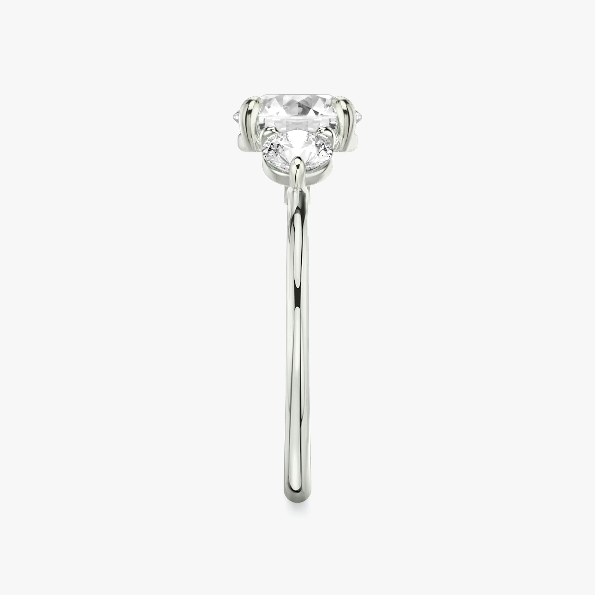 The Three Stone | Round Brilliant | 18k | White Gold | bandAccent: Plain | caratWeight: other | sideStoneCarat: 0.25ct | sideStoneShape: Round Brilliant | diamondOrientation: vertical
