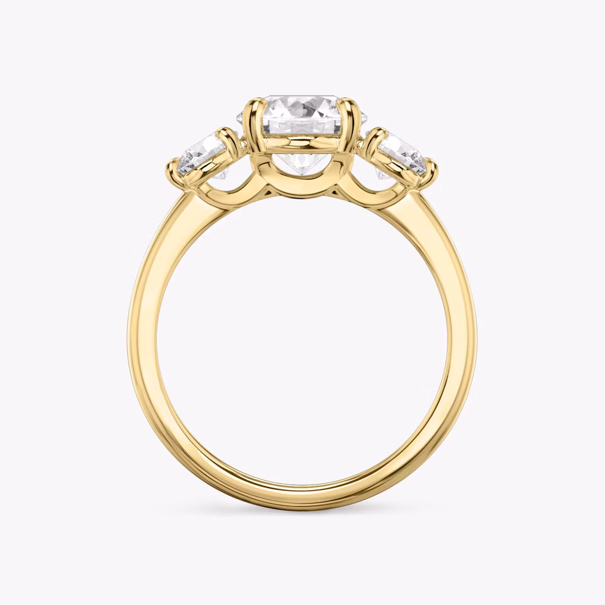 The Three Stone | Round Brilliant | 18k | Yellow Gold | bandAccent: Plain | caratWeight: other | sideStoneCarat: 0.25ct | sideStoneShape: Round Brilliant | diamondOrientation: vertical