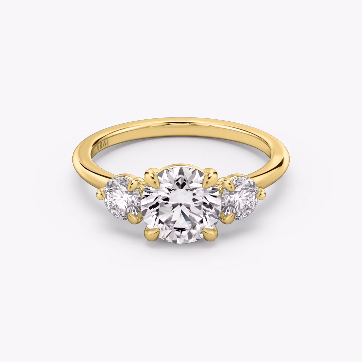 The Three Stone Round Brilliant | Yellow Gold
