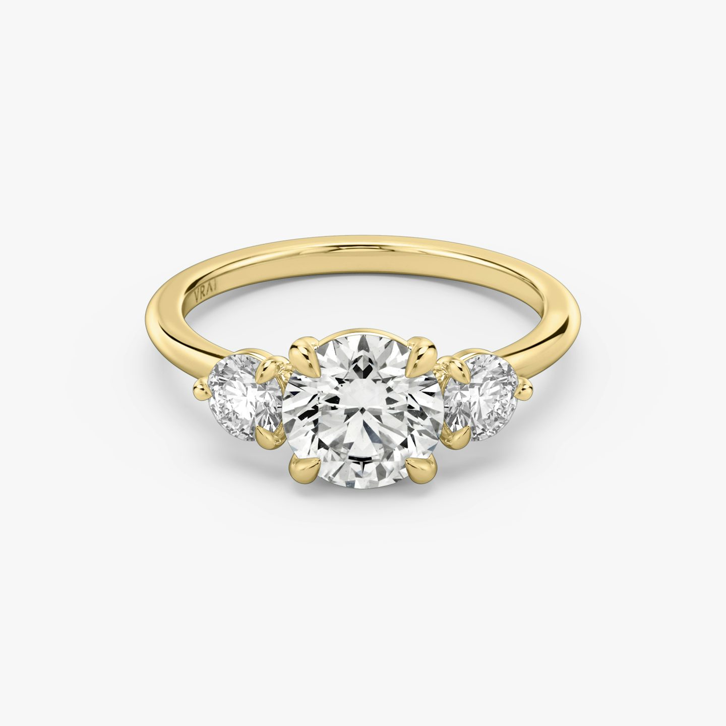 The Three Stone | Round Brilliant | 18k | Yellow Gold | bandAccent: Plain | caratWeight: other | sideStoneCarat: 0.25ct | sideStoneShape: Round Brilliant | diamondOrientation: vertical