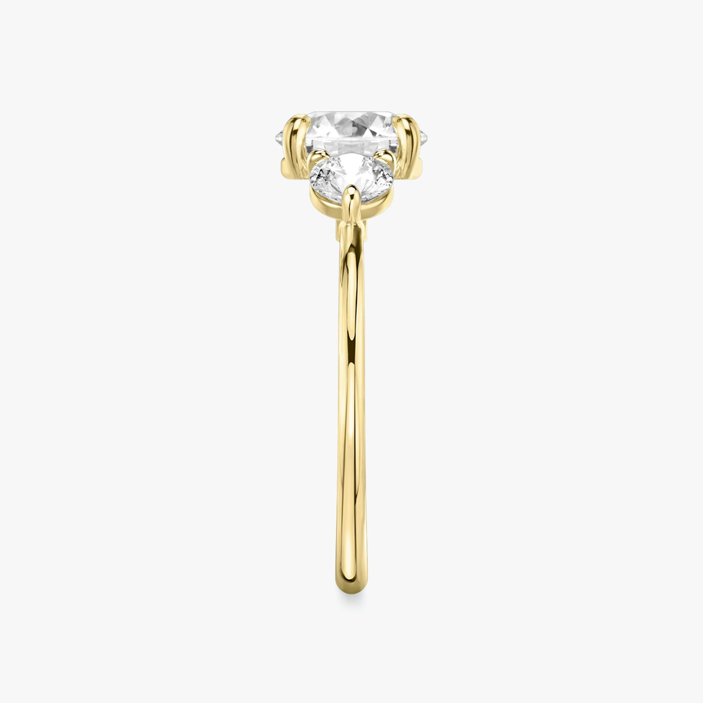 The Three Stone | Round Brilliant | 18k | Yellow Gold | bandAccent: Plain | caratWeight: other | sideStoneCarat: 0.25ct | sideStoneShape: Round Brilliant | diamondOrientation: vertical