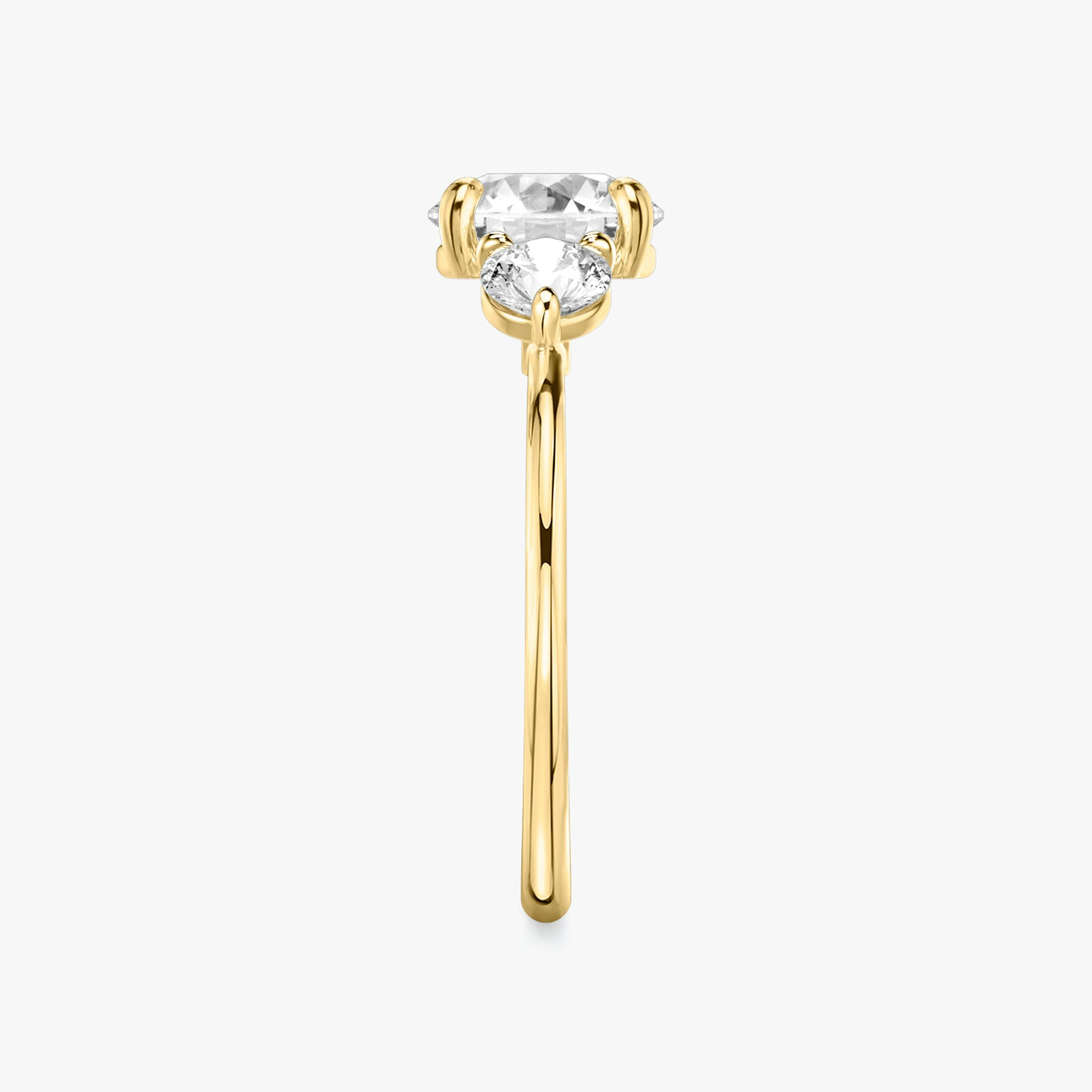 The Three Stone | Round Brilliant | 18k | Yellow Gold | bandAccent: Plain | caratWeight: other | sideStoneCarat: 0.25ct | sideStoneShape: Round Brilliant | diamondOrientation: vertical