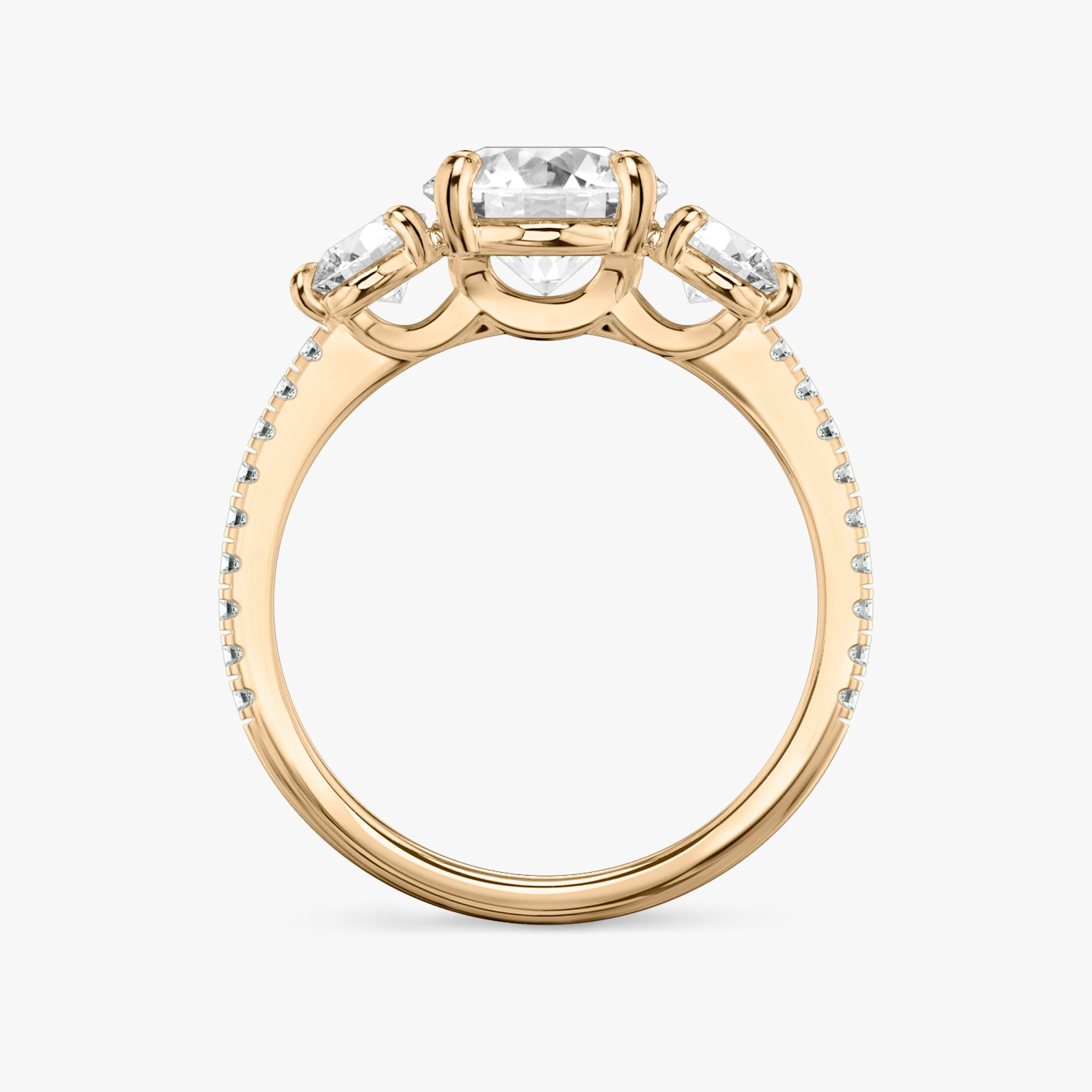 The Three Stone | Round Brilliant | 14k | Rose Gold | bandAccent: Pavé | caratWeight: other | sideStoneCarat: 0.25ct | sideStoneShape: Round Brilliant | diamondOrientation: vertical