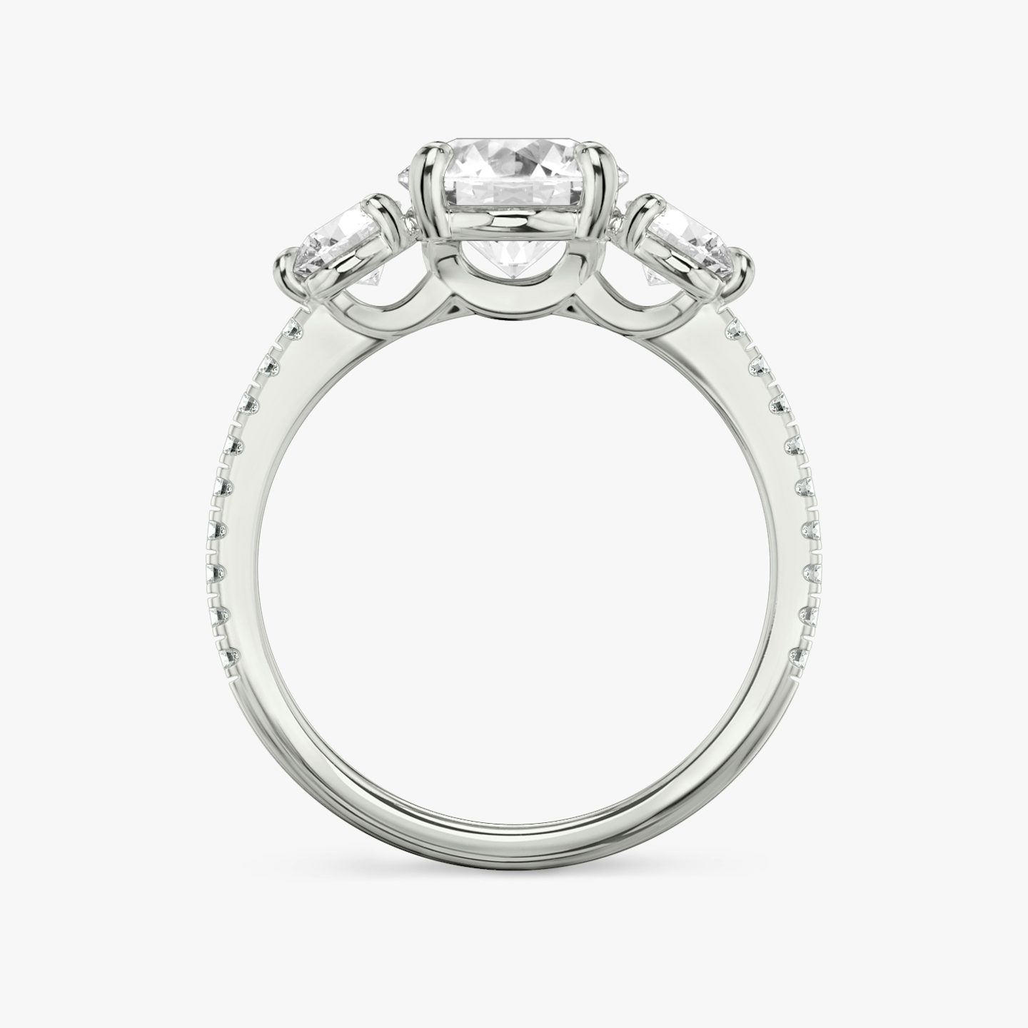 The Three Stone | Round Brilliant | 18k | White Gold | bandAccent: Pavé | caratWeight: other | sideStoneCarat: 0.25ct | sideStoneShape: Round Brilliant | diamondOrientation: vertical