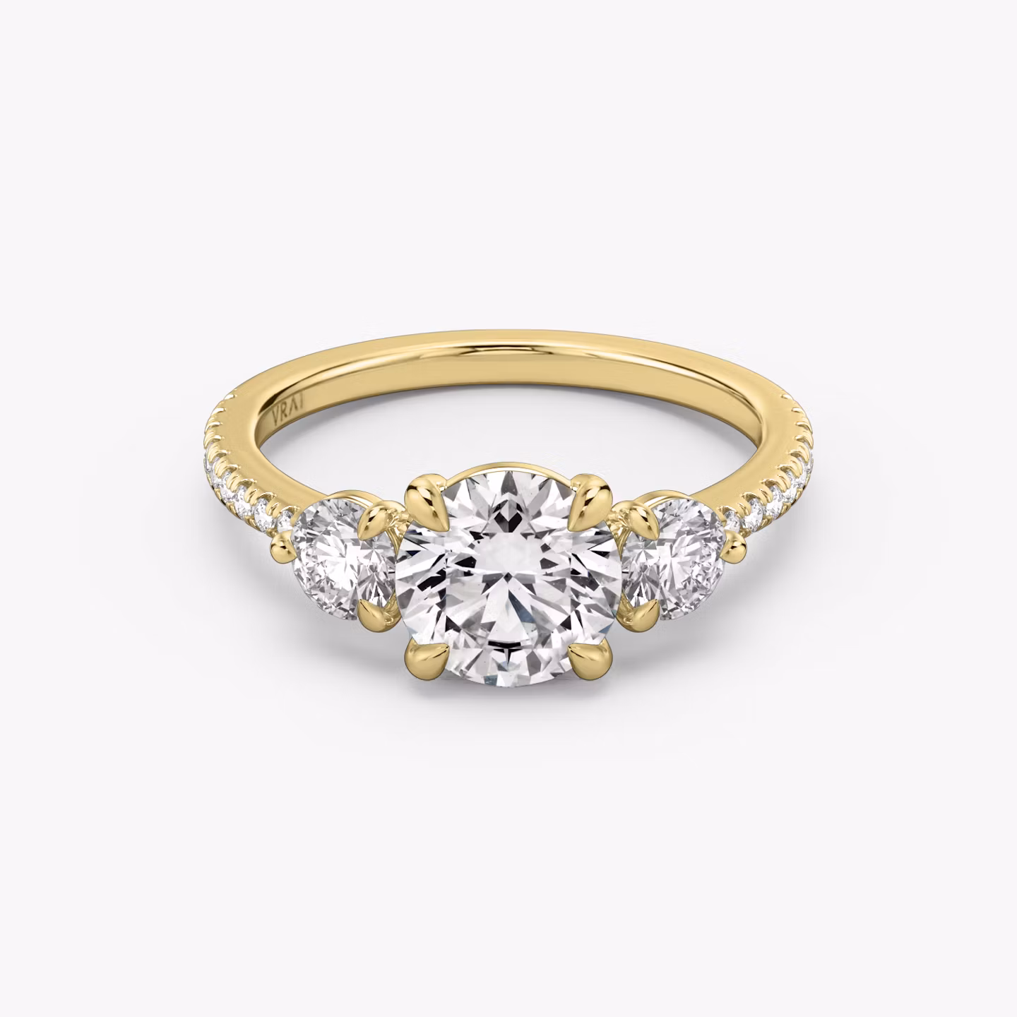 The Three Stone Round Brilliant | Yellow Gold