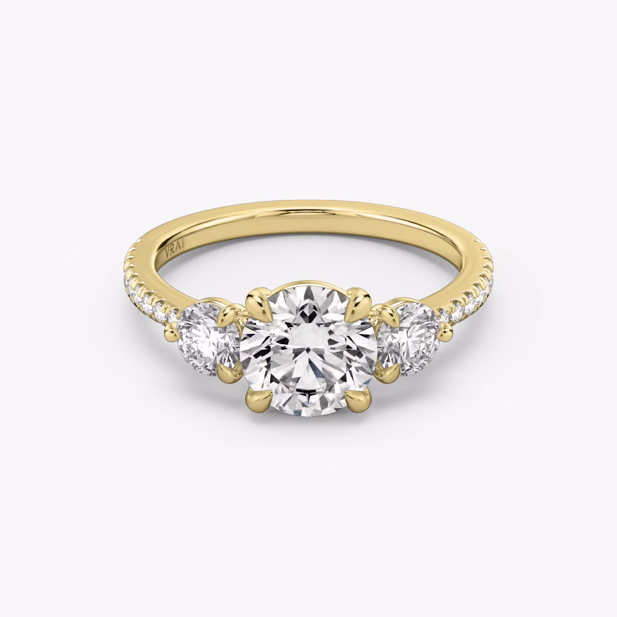 The Three Stone Round Brilliant | Yellow Gold