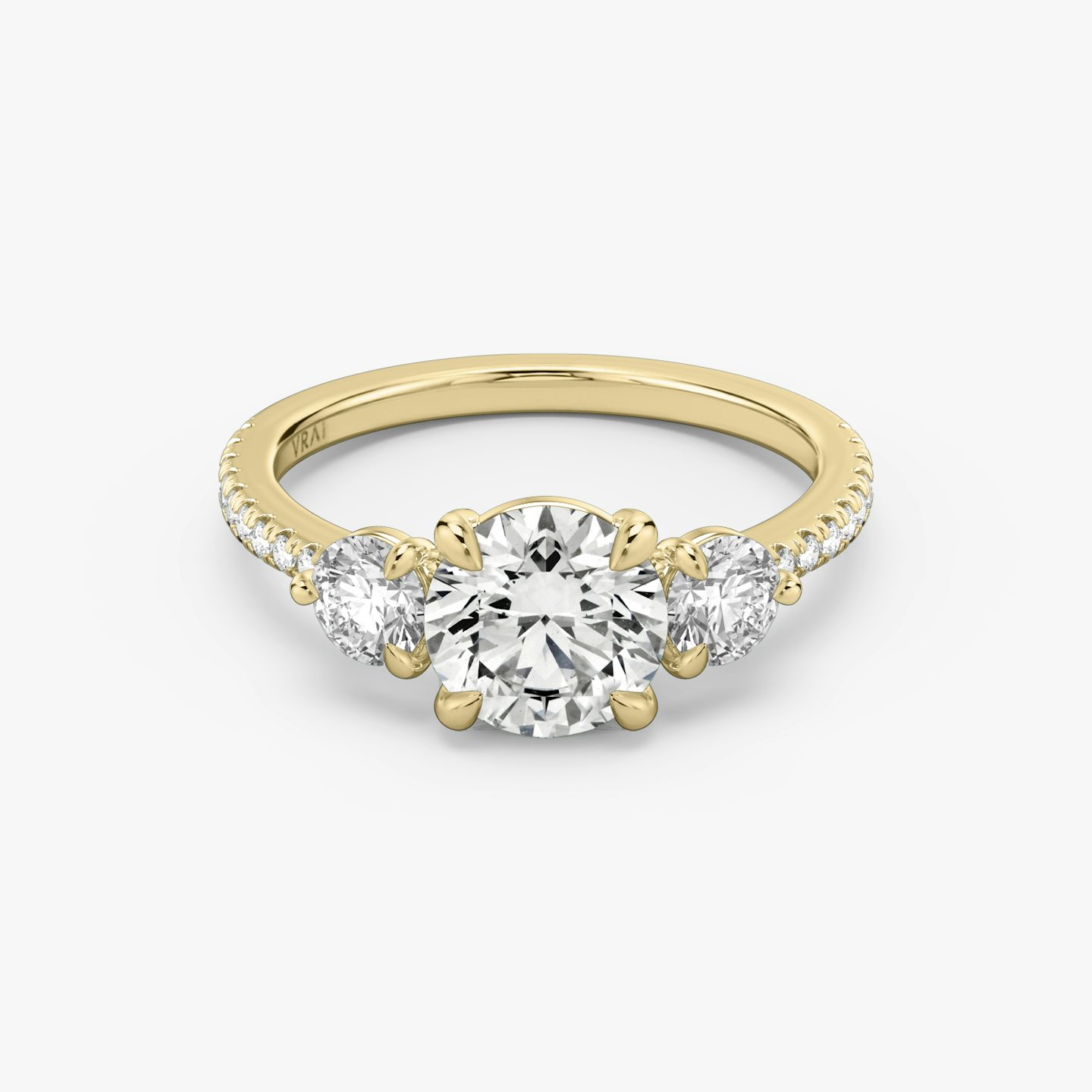 The Three Stone | Round Brilliant | 18k | Yellow Gold | bandAccent: Pavé | caratWeight: other | sideStoneCarat: 0.25ct | sideStoneShape: Round Brilliant | diamondOrientation: vertical