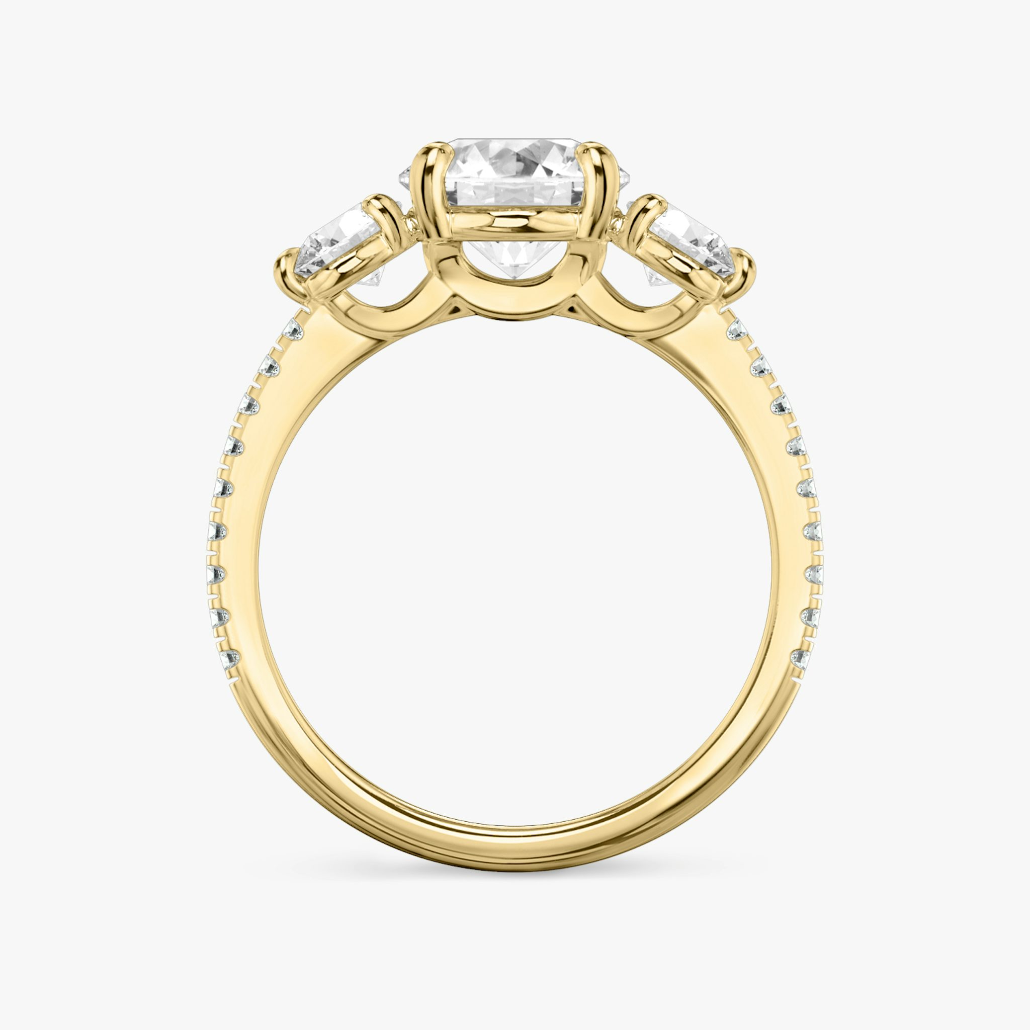 The Three Stone | Round Brilliant | 18k | Yellow Gold | bandAccent: Pavé | caratWeight: other | sideStoneCarat: 0.25ct | sideStoneShape: Round Brilliant | diamondOrientation: vertical