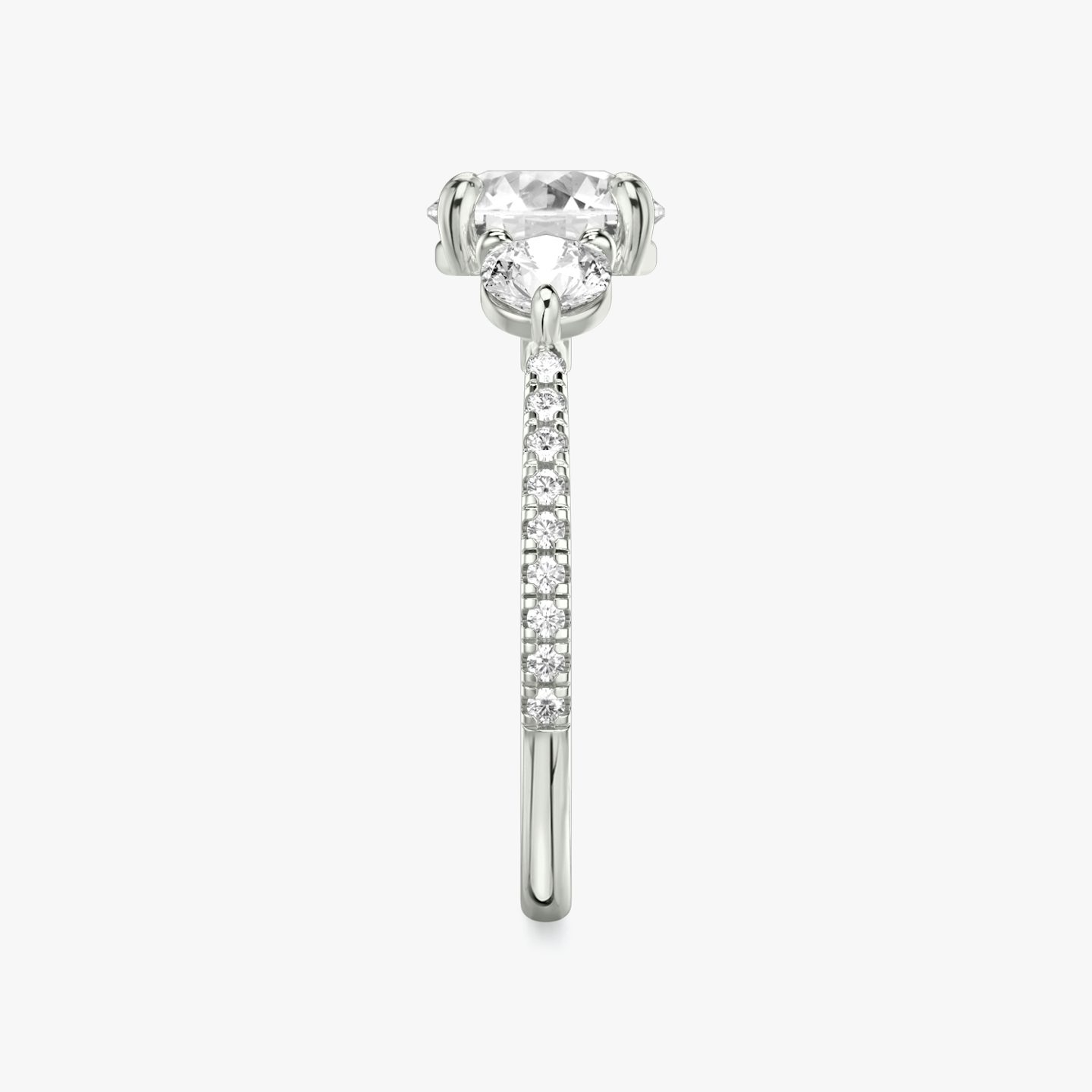 The Three Stone | Round Brilliant | 18k | White Gold | bandAccent: Pavé | caratWeight: other | sideStoneCarat: 0.25ct | sideStoneShape: Round Brilliant | diamondOrientation: vertical