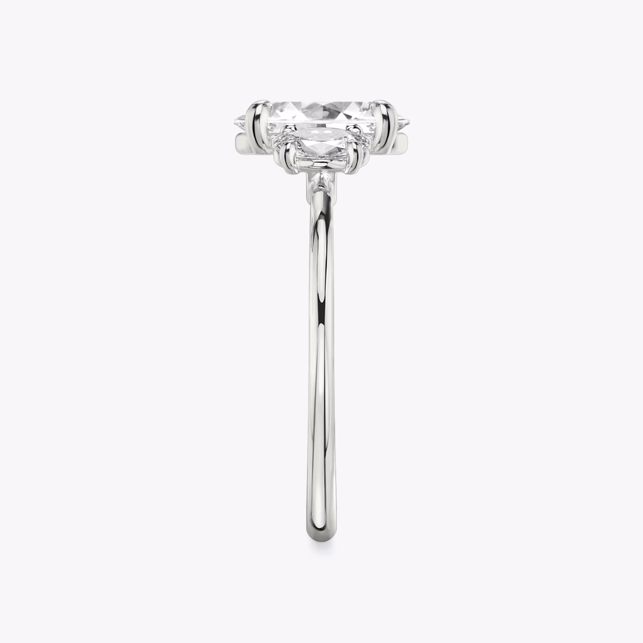 The Three Stone | Oval | 18k | White Gold | bandAccent: Plain | sideStoneCarat: 0.25ct | sideStoneShape: Oval | diamondOrientation: vertical | caratWeight: other