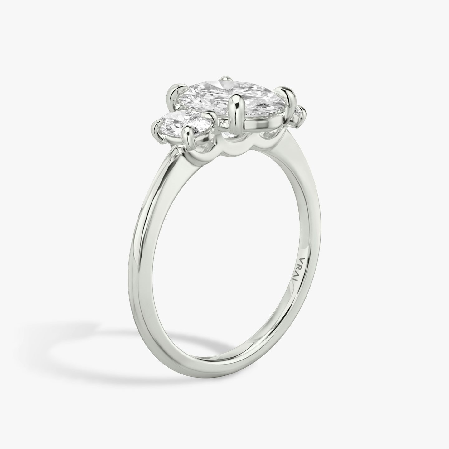 The Three Stone | Oval | Platinum | bandAccent: Plain | sideStoneCarat: 0.25ct | sideStoneShape: Oval | diamondOrientation: vertical | caratWeight: other