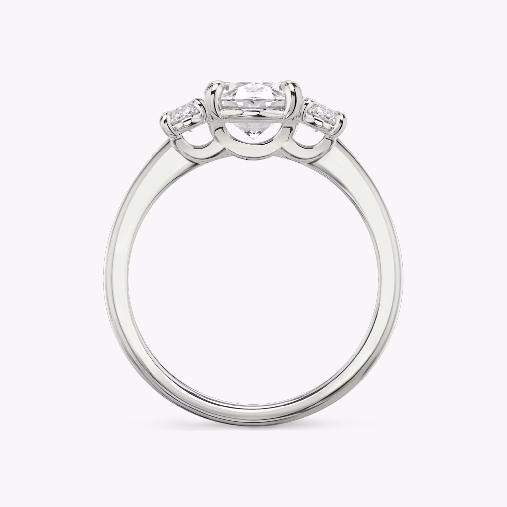 The Three Stone | Oval | 18k | White Gold | bandAccent: Plain | sideStoneCarat: 0.25ct | sideStoneShape: Oval | diamondOrientation: vertical | caratWeight: other