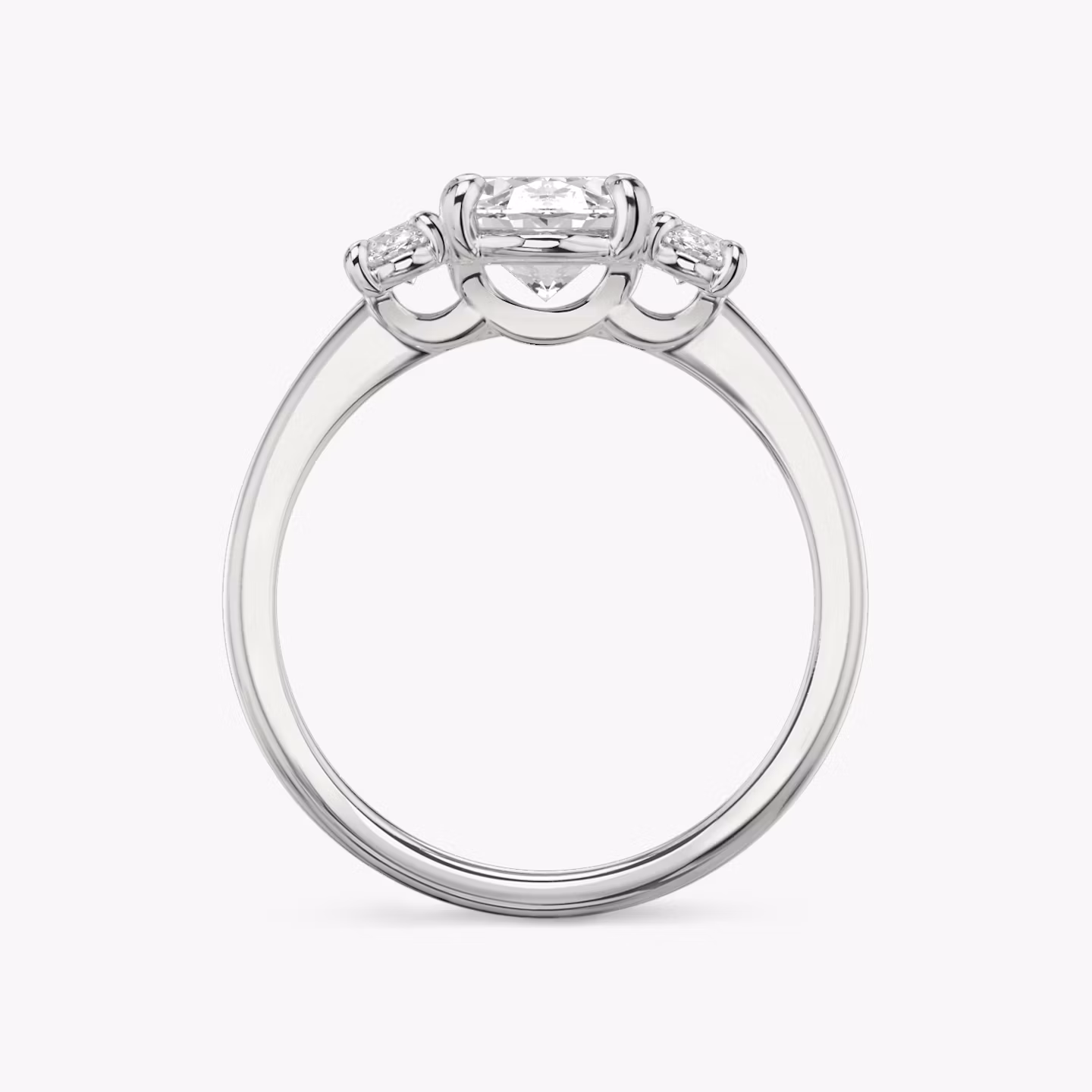 The Three Stone | Oval | 18k | White Gold | bandAccent: Plain | sideStoneCarat: 0.25ct | sideStoneShape: Oval | diamondOrientation: vertical | caratWeight: other