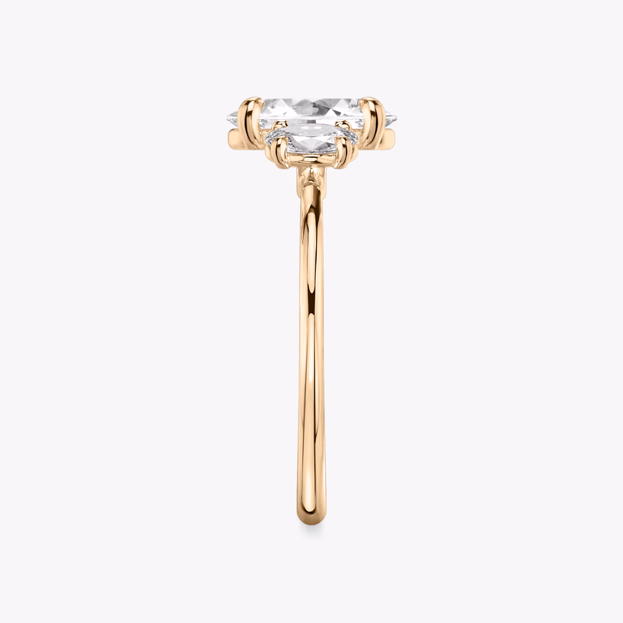 The Three Stone | Oval | 14k | Rose Gold | bandAccent: Plain | sideStoneCarat: 0.25ct | sideStoneShape: Oval | diamondOrientation: vertical | caratWeight: other