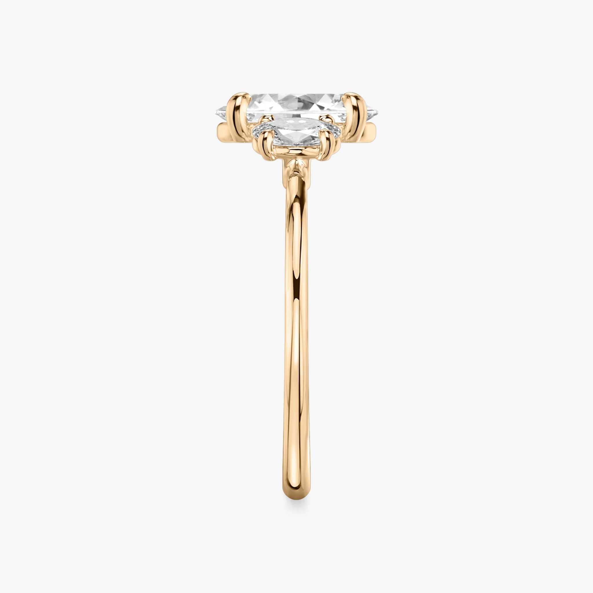 The Three Stone | Oval | 14k | Rose Gold | bandAccent: Plain | sideStoneCarat: 0.25ct | sideStoneShape: Oval | diamondOrientation: vertical | caratWeight: other