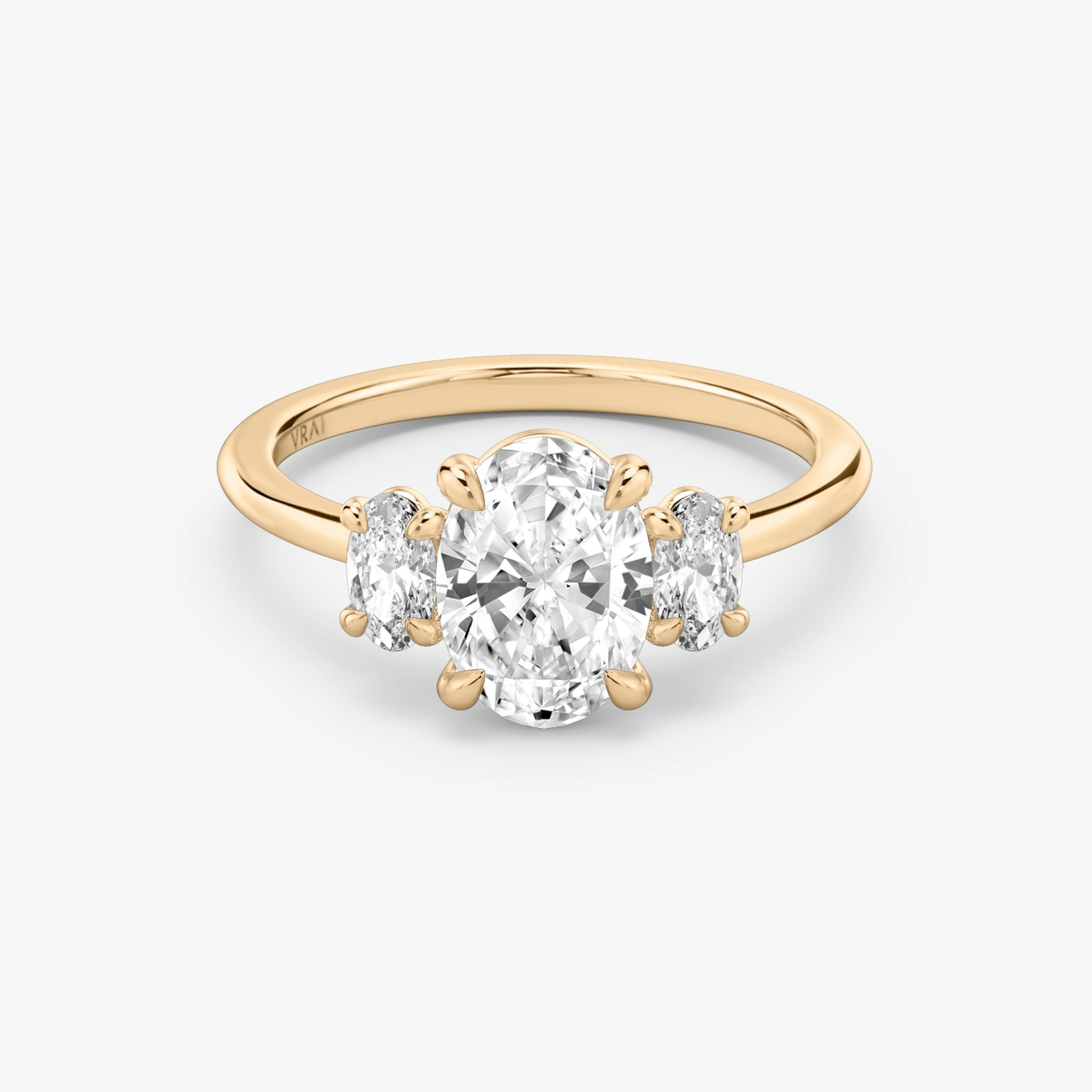 The Three Stone | Oval | 14k | Rose Gold | bandAccent: Plain | sideStoneCarat: 0.25ct | sideStoneShape: Oval | diamondOrientation: vertical | caratWeight: other