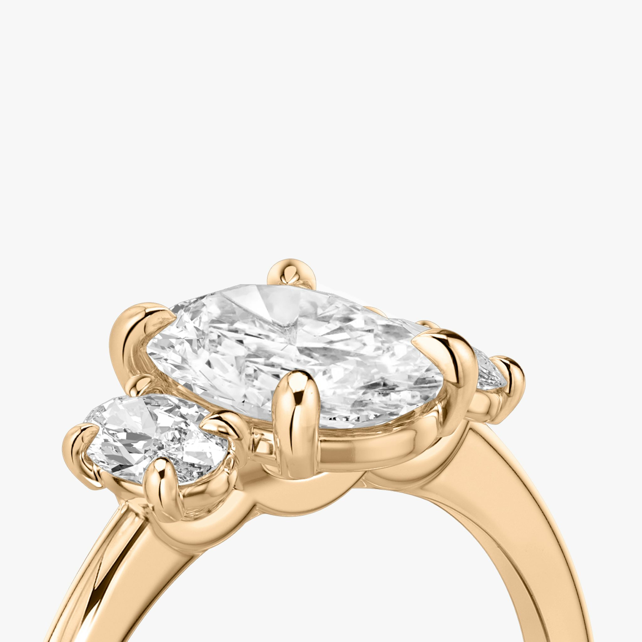 The Three Stone | Oval | 14k | Rose Gold | bandAccent: Plain | sideStoneCarat: 0.25ct | sideStoneShape: Oval | diamondOrientation: vertical | caratWeight: other