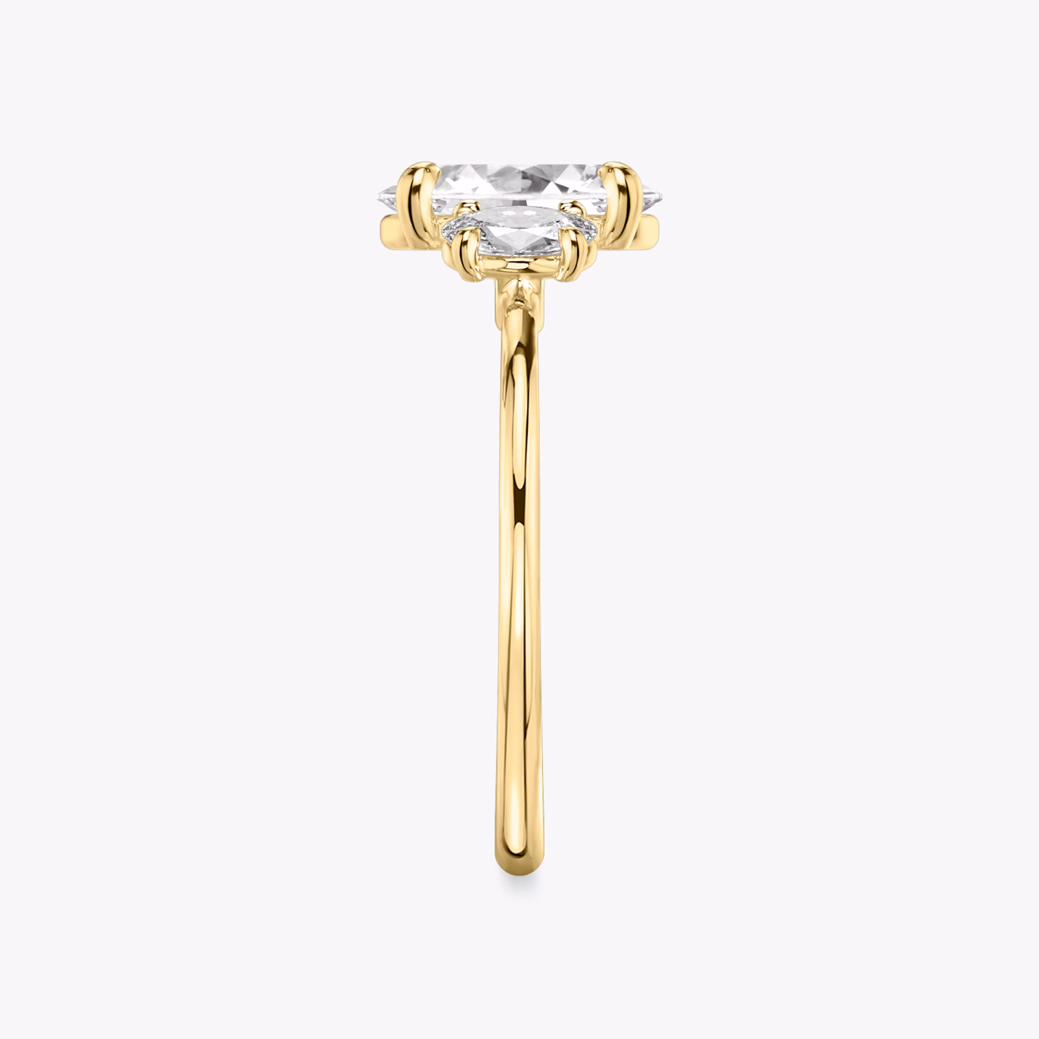 The Three Stone | Oval | 18k | Yellow Gold | bandAccent: Plain | sideStoneCarat: 0.25ct | sideStoneShape: Oval | diamondOrientation: vertical | caratWeight: other