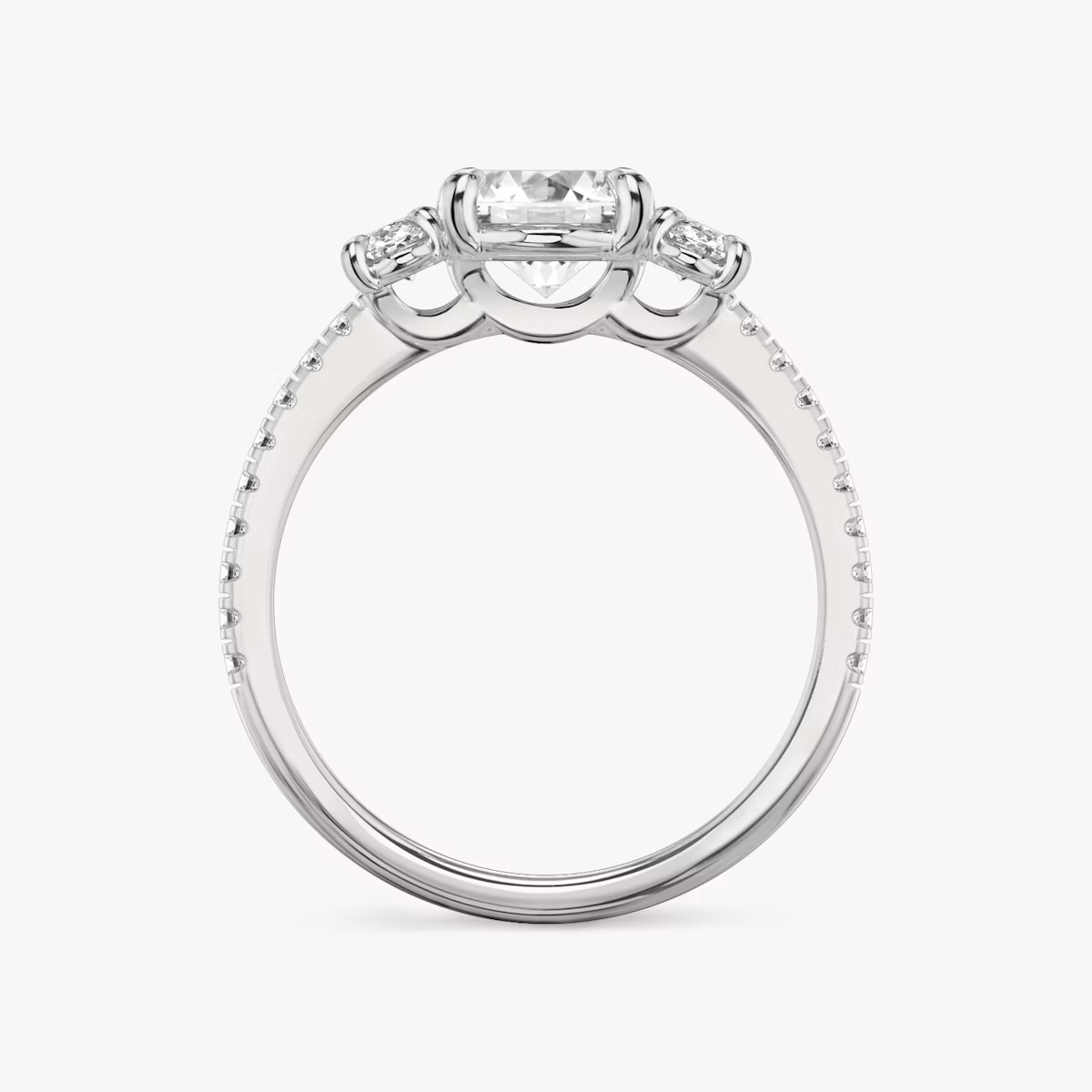 The Three Stone | Oval | 18k | White Gold | bandAccent: Pavé | sideStoneCarat: 0.25ct | sideStoneShape: Oval | diamondOrientation: vertical | caratWeight: other