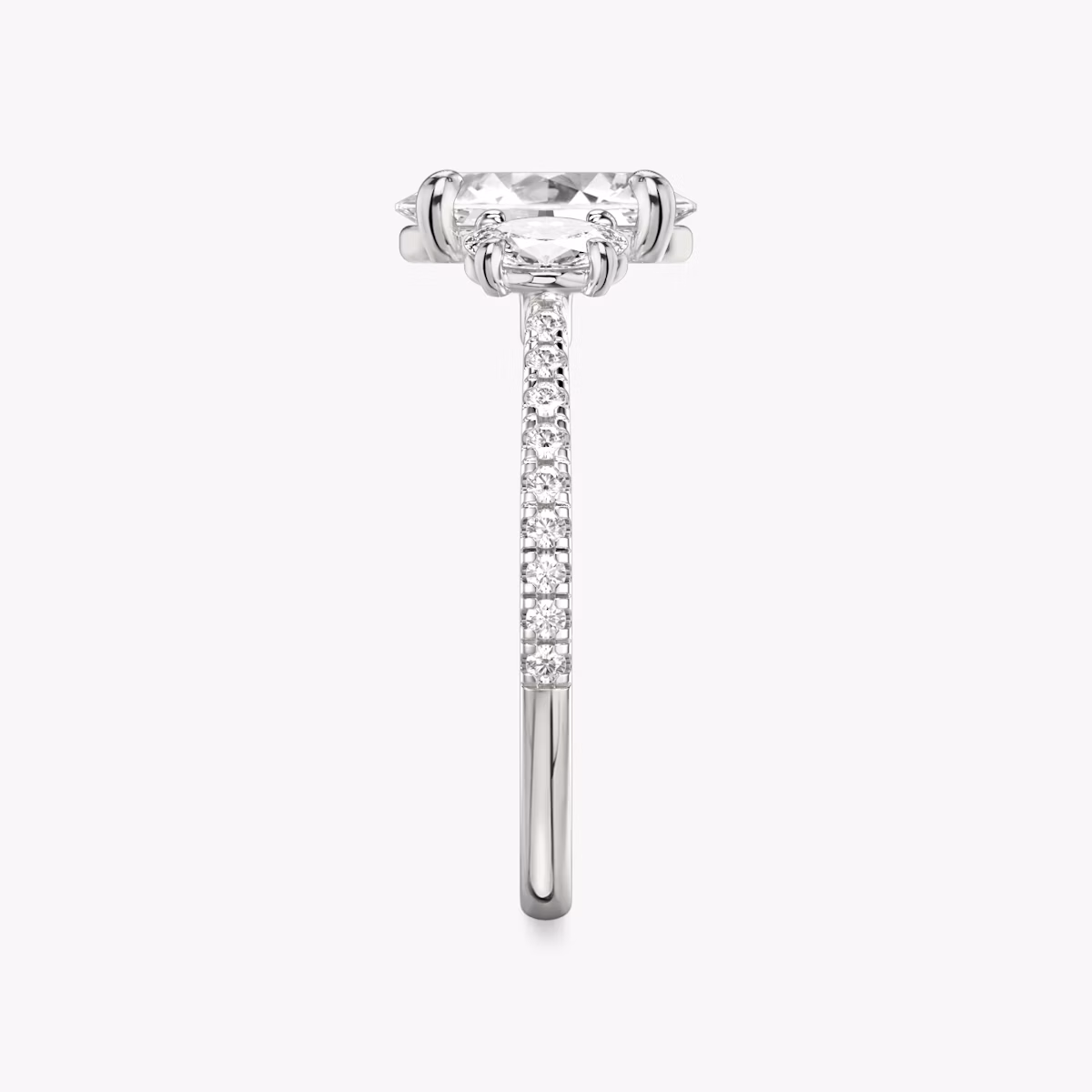 The Three Stone | Oval | 18k | White Gold | bandAccent: Pavé | sideStoneCarat: 0.25ct | sideStoneShape: Oval | diamondOrientation: vertical | caratWeight: other