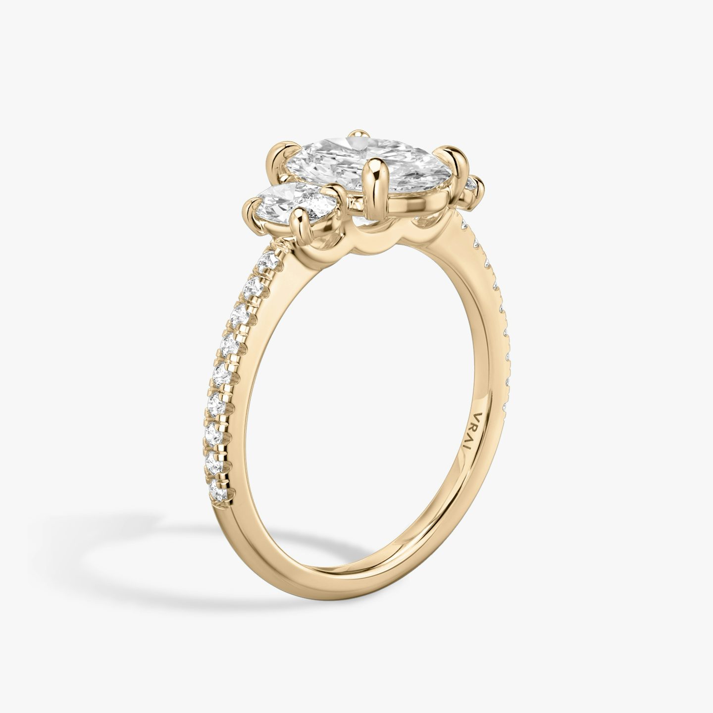 The Three Stone | Oval | 14k | Rose Gold | bandAccent: Pavé | sideStoneCarat: 0.25ct | sideStoneShape: Oval | diamondOrientation: vertical | caratWeight: other
