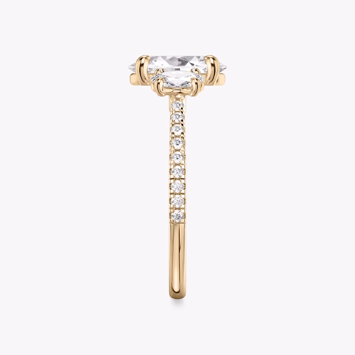 The Three Stone | Oval | 14k | Rose Gold | bandAccent: Pavé | sideStoneCarat: 0.25ct | sideStoneShape: Oval | diamondOrientation: vertical | caratWeight: other