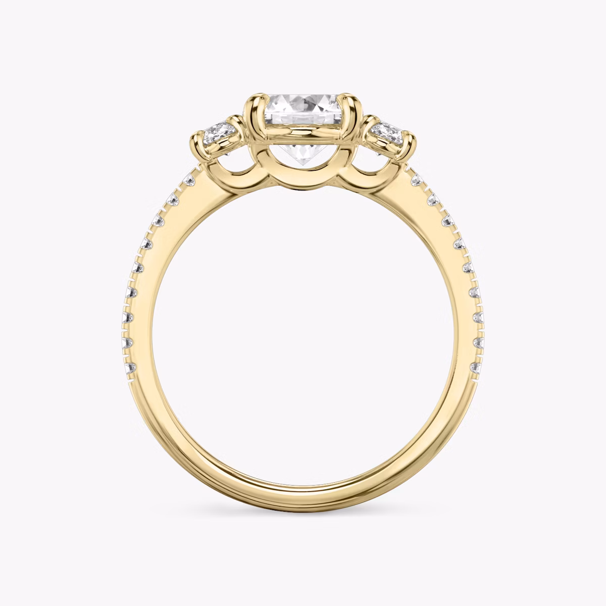 The Three Stone | Oval | 18k | Yellow Gold | bandAccent: Pavé | sideStoneCarat: 0.25ct | sideStoneShape: Oval | diamondOrientation: vertical | caratWeight: other