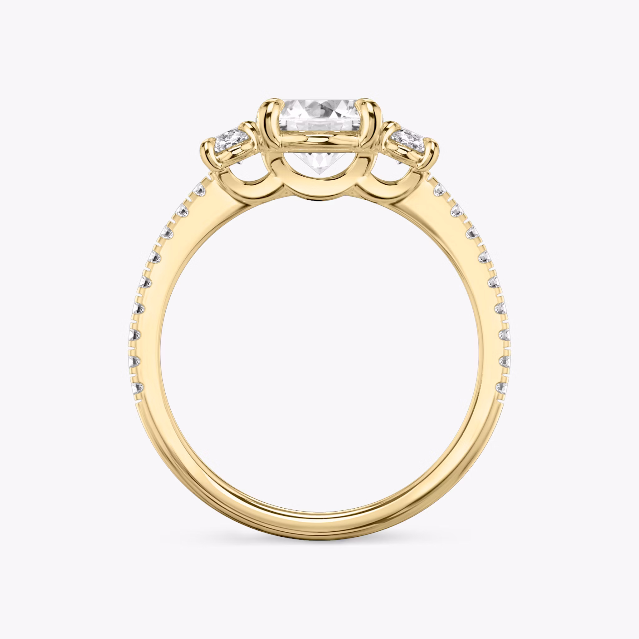 The Three Stone | Oval | 18k | Yellow Gold | bandAccent: Pavé | sideStoneCarat: 0.25ct | sideStoneShape: Oval | diamondOrientation: vertical | caratWeight: other