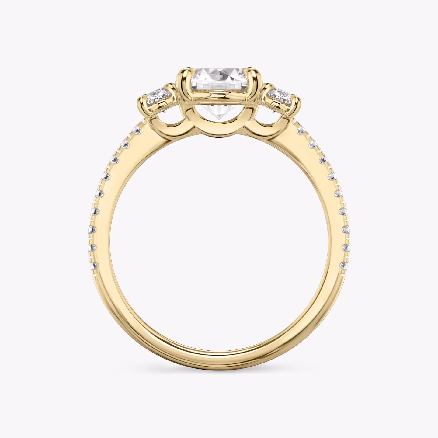 The Three Stone | Oval | 18k | Yellow Gold | bandAccent: Pavé | sideStoneCarat: 0.25ct | sideStoneShape: Oval | diamondOrientation: vertical | caratWeight: other