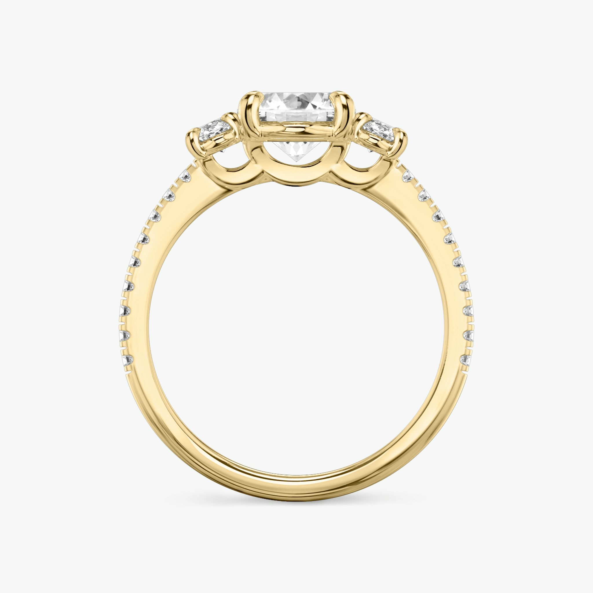 The Three Stone | Oval | 18k | Yellow Gold | bandAccent: Pavé | sideStoneCarat: 0.25ct | sideStoneShape: Oval | diamondOrientation: vertical | caratWeight: other