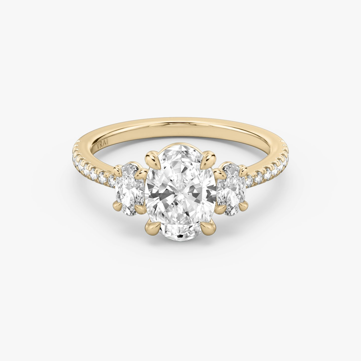 The Three Stone | Oval | 14k | Rose Gold | bandAccent: Pavé | sideStoneCarat: 0.25ct | sideStoneShape: Oval | diamondOrientation: vertical | caratWeight: other
