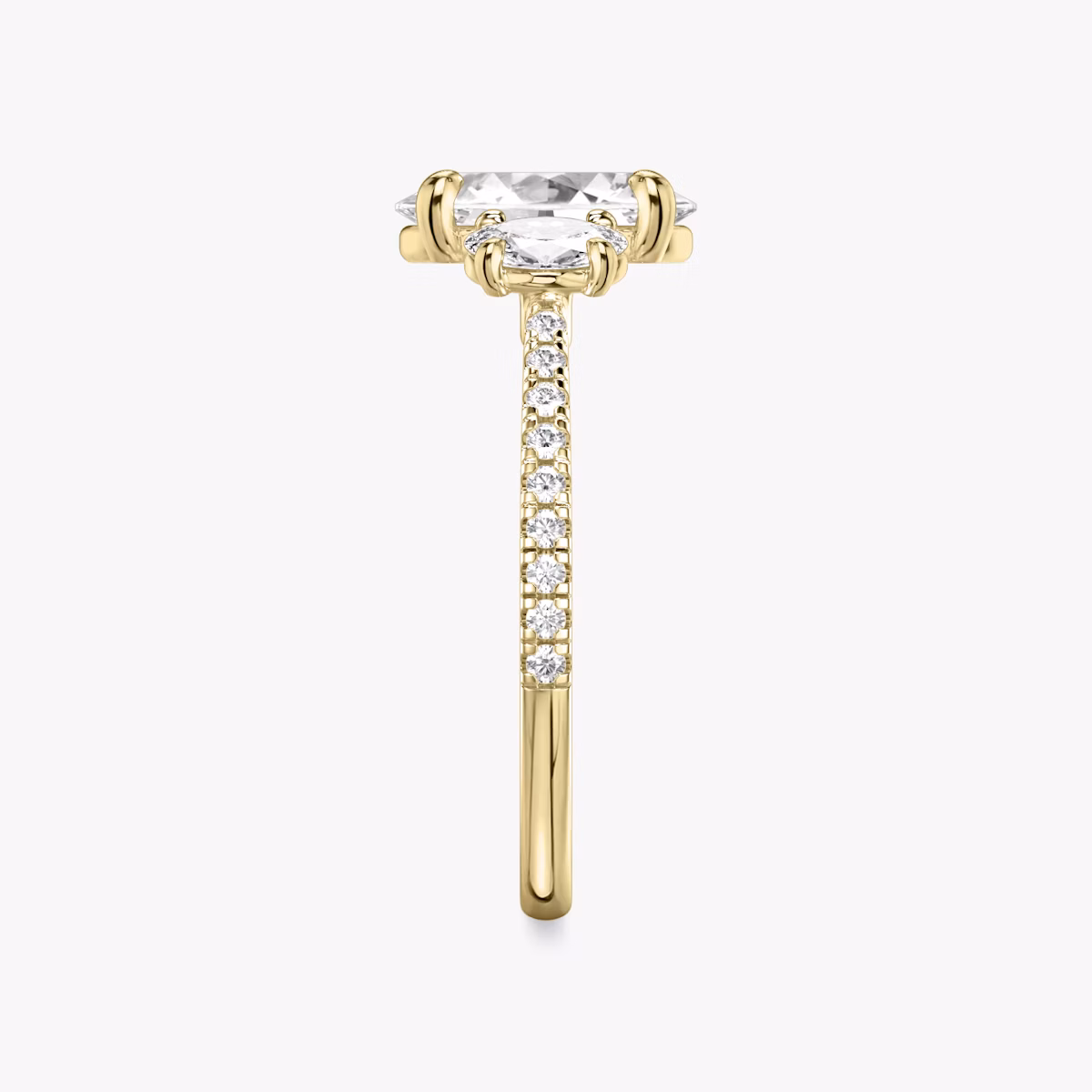The Three Stone | Oval | 18k | Yellow Gold | bandAccent: Pavé | sideStoneCarat: 0.25ct | sideStoneShape: Oval | diamondOrientation: vertical | caratWeight: other