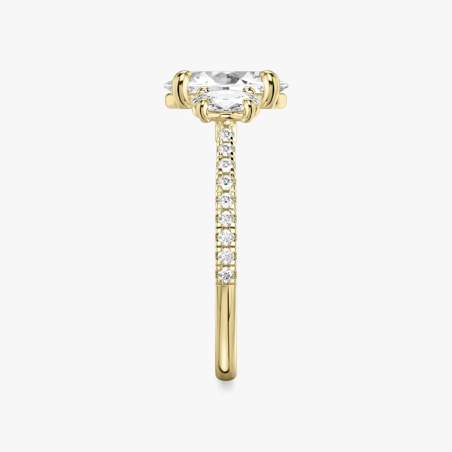 The Three Stone | Oval | 18k | Yellow Gold | bandAccent: Pavé | sideStoneCarat: 0.25ct | sideStoneShape: Oval | diamondOrientation: vertical | caratWeight: other