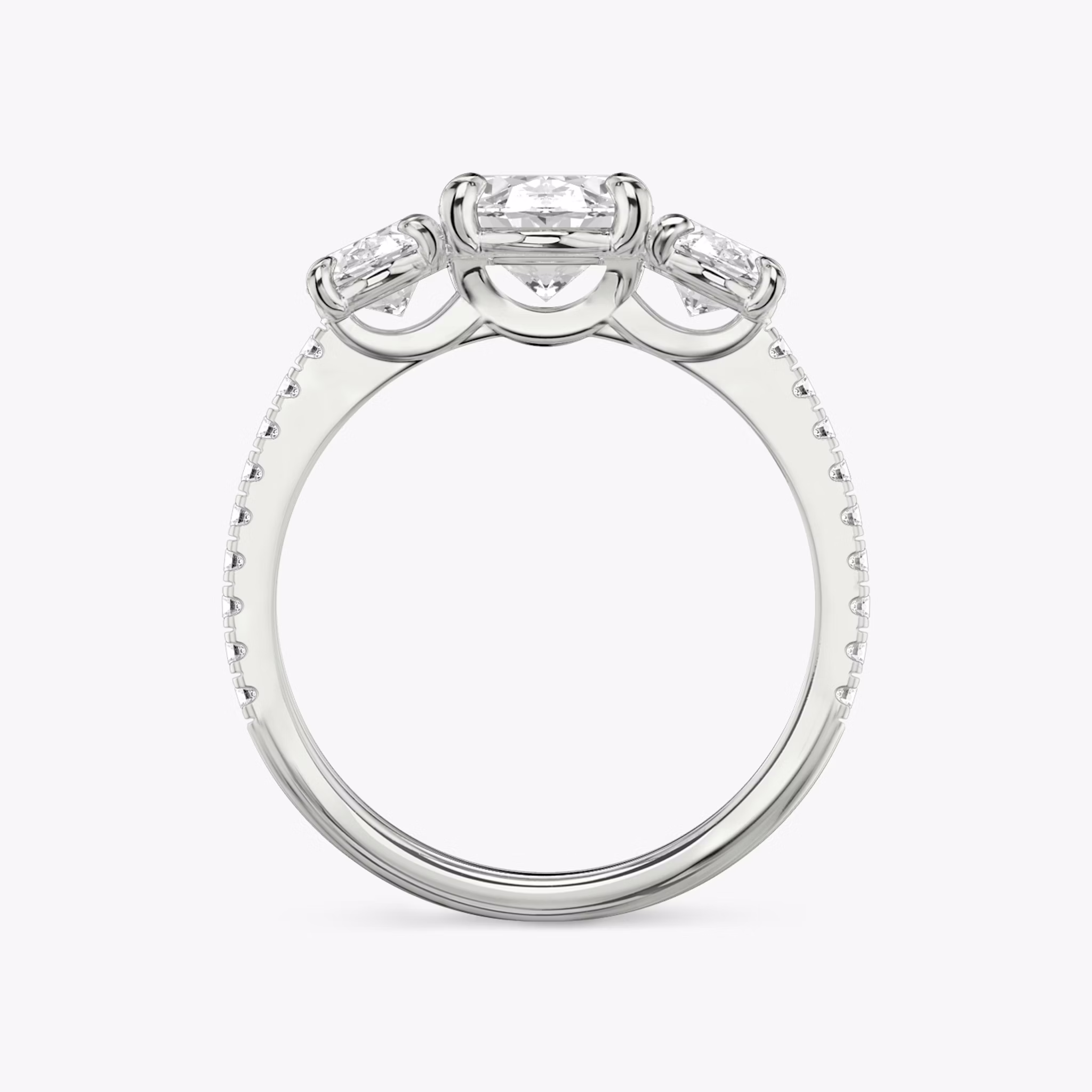 The Three Stone | Oval | 18k | White Gold | bandAccent: Pavé | sideStoneCarat: 0.50ct | sideStoneShape: Oval | diamondOrientation: vertical | caratWeight: other