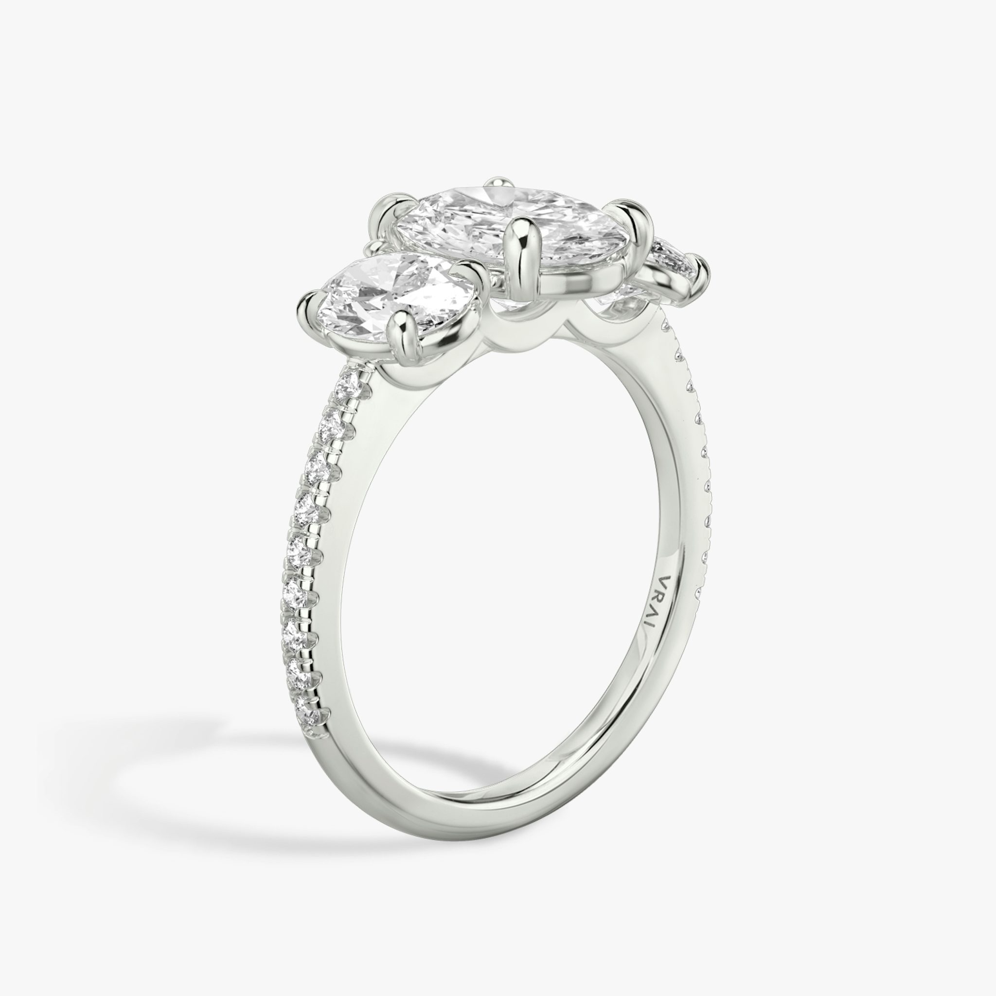 The Three Stone | Oval | Platinum | bandAccent: Pavé | sideStoneCarat: 0.50ct | sideStoneShape: Oval | diamondOrientation: vertical | caratWeight: other