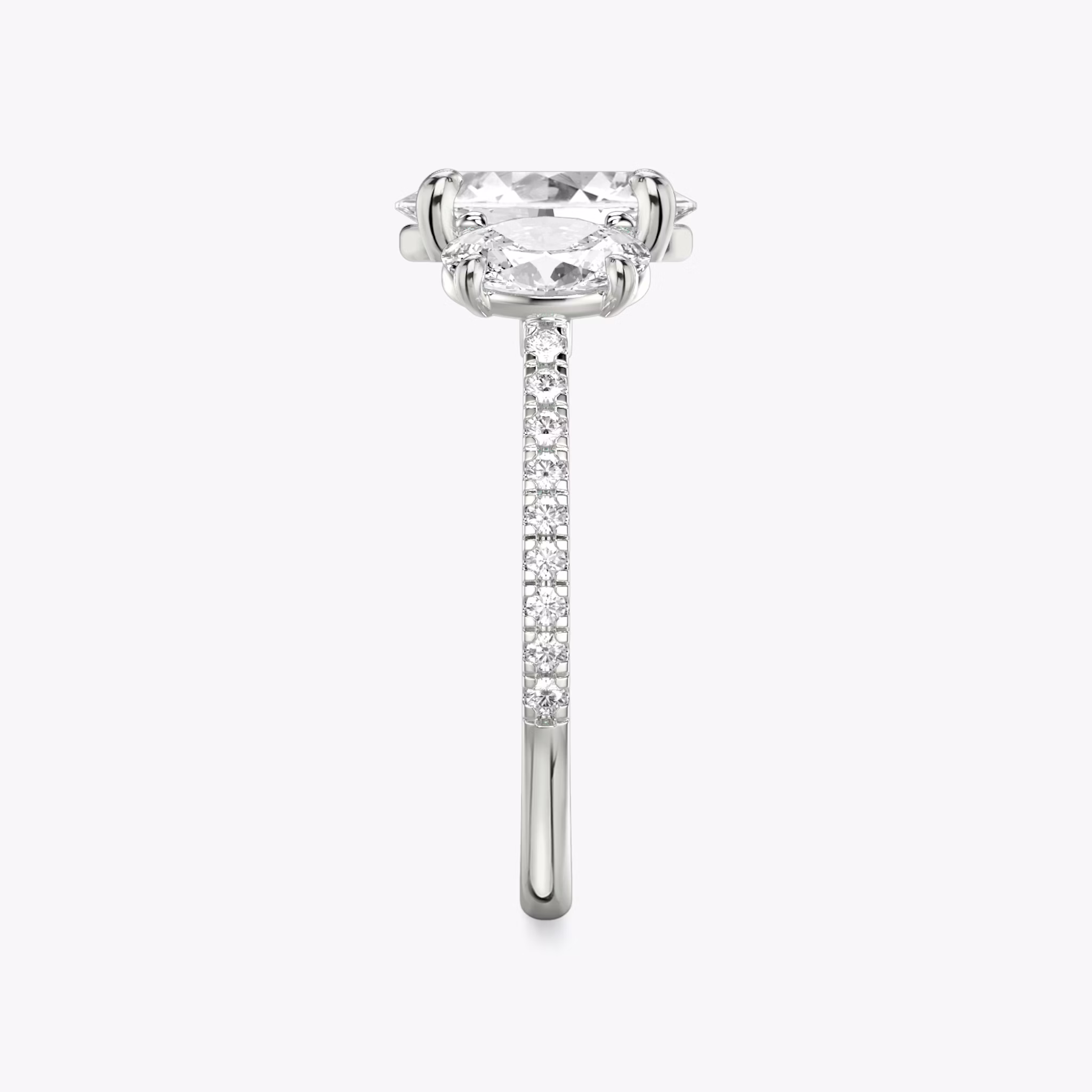 The Three Stone | Oval | 18k | White Gold | bandAccent: Pavé | sideStoneCarat: 0.50ct | sideStoneShape: Oval | diamondOrientation: vertical | caratWeight: other