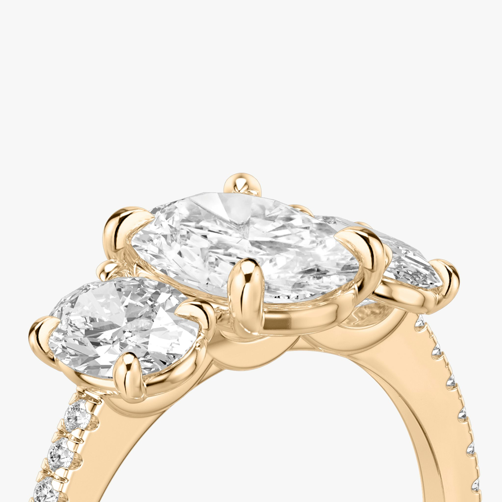 The Three Stone | Oval | 14k | Rose Gold | bandAccent: Pavé | sideStoneCarat: 0.50ct | sideStoneShape: Oval | diamondOrientation: vertical | caratWeight: other