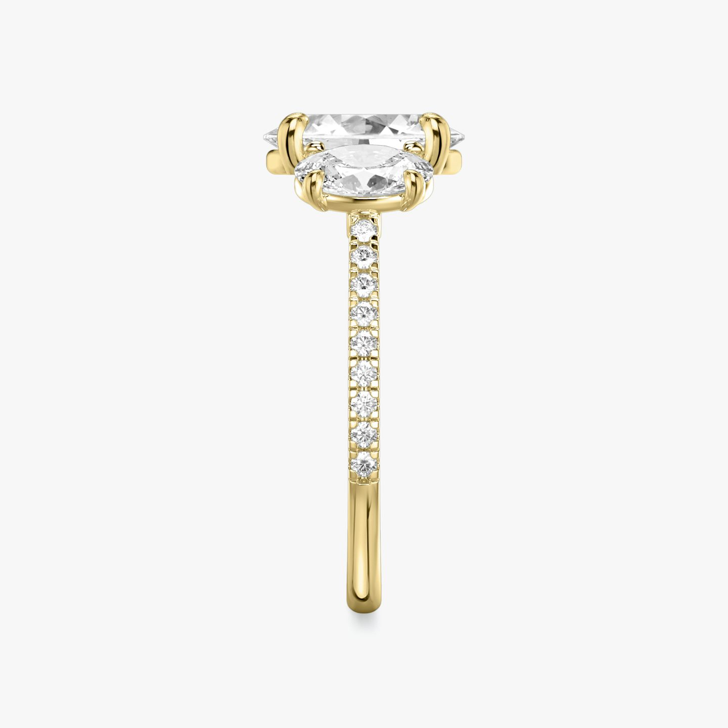 The Three Stone | Oval | 18k | Yellow Gold | bandAccent: Pavé | sideStoneCarat: 0.50ct | sideStoneShape: Oval | diamondOrientation: vertical | caratWeight: other