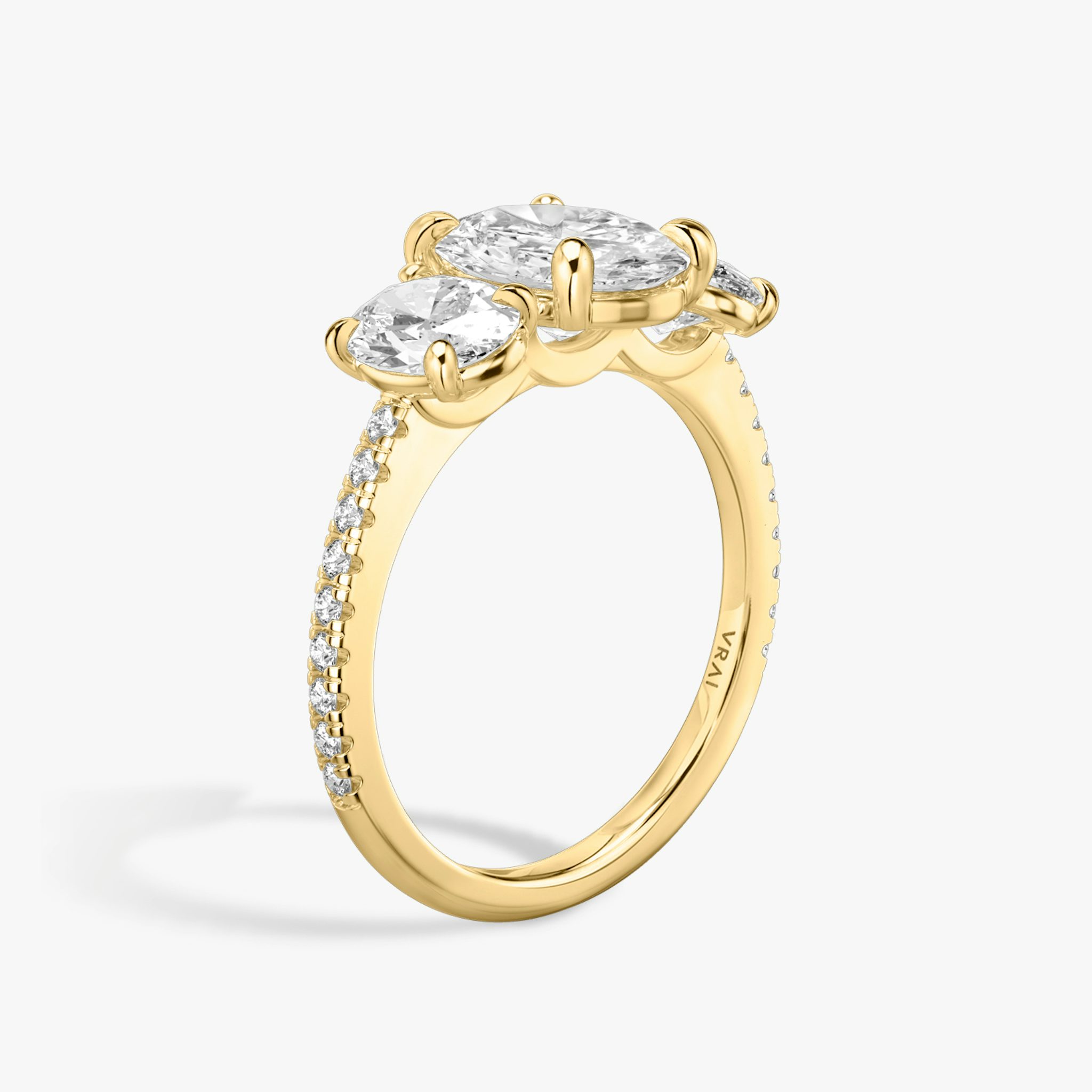 The Three Stone | Oval | 18k | Yellow Gold | bandAccent: Pavé | sideStoneCarat: 0.50ct | sideStoneShape: Oval | diamondOrientation: vertical | caratWeight: other