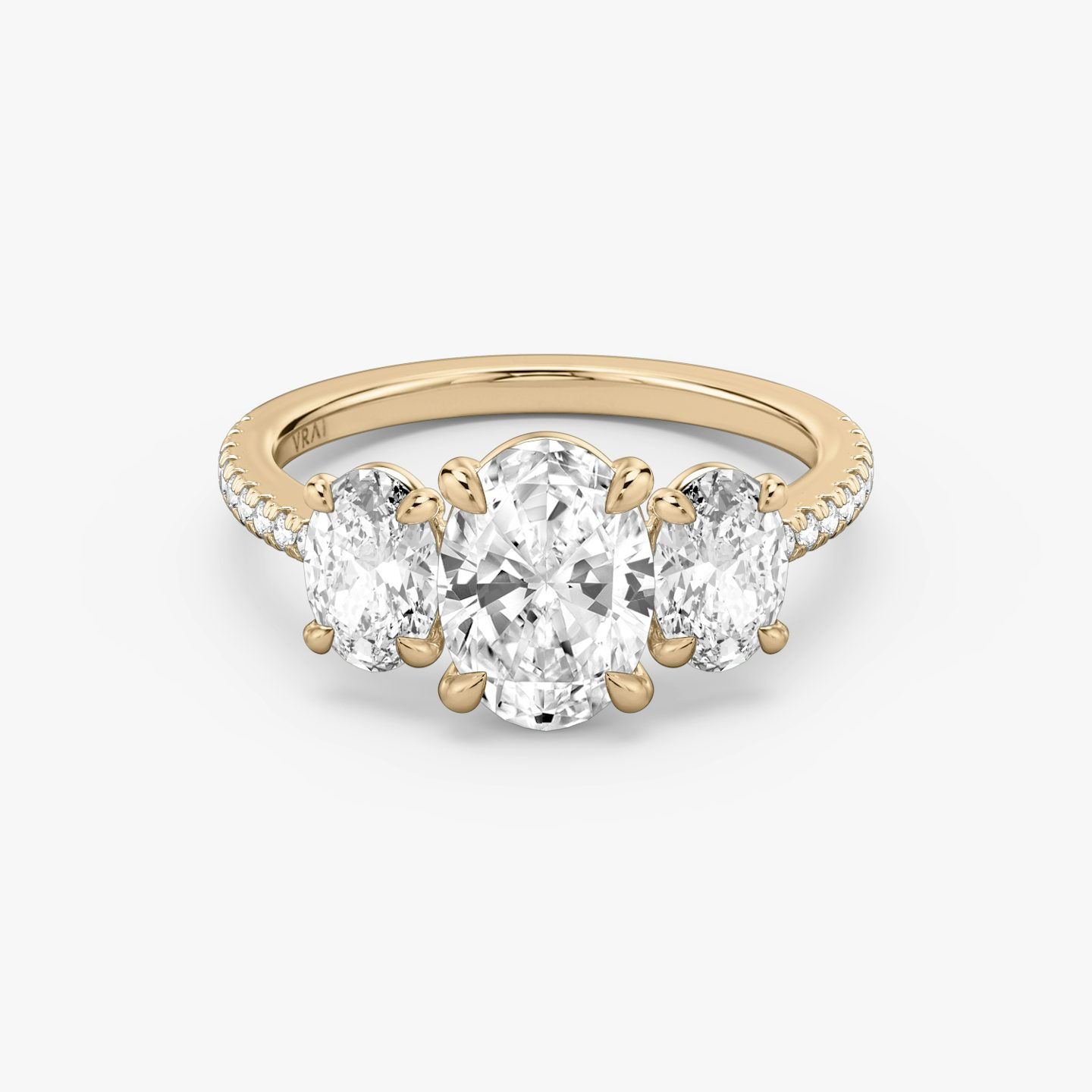 The Three Stone | Oval | 14k | Rose Gold | bandAccent: Pavé | sideStoneCarat: 0.50ct | sideStoneShape: Oval | diamondOrientation: vertical | caratWeight: other