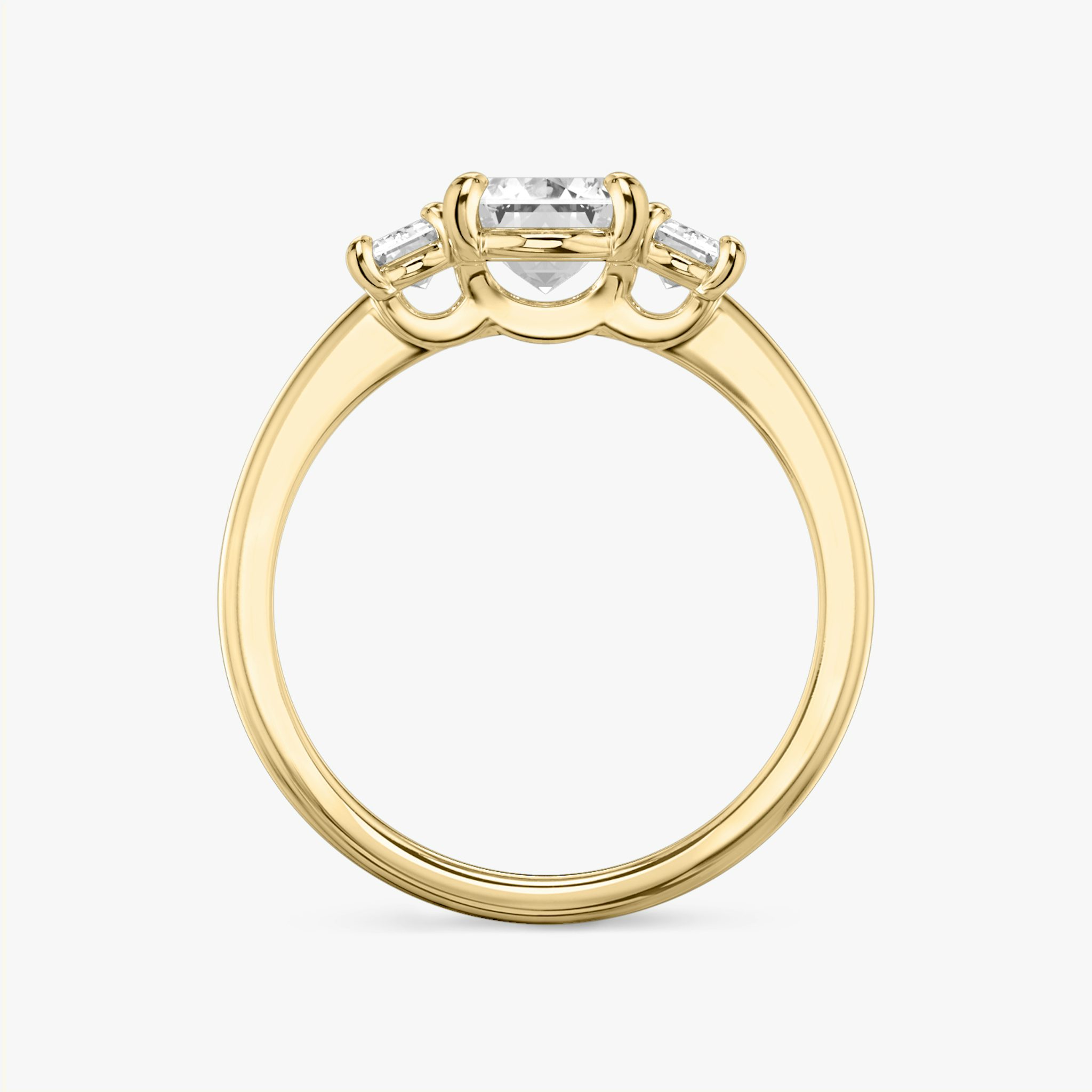 The Three Stone | Emerald | 18k | Yellow Gold | bandAccent: Plain | sideStoneCarat: 0.25ct | sideStoneShape: Emerald | diamondOrientation: vertical | caratWeight: other