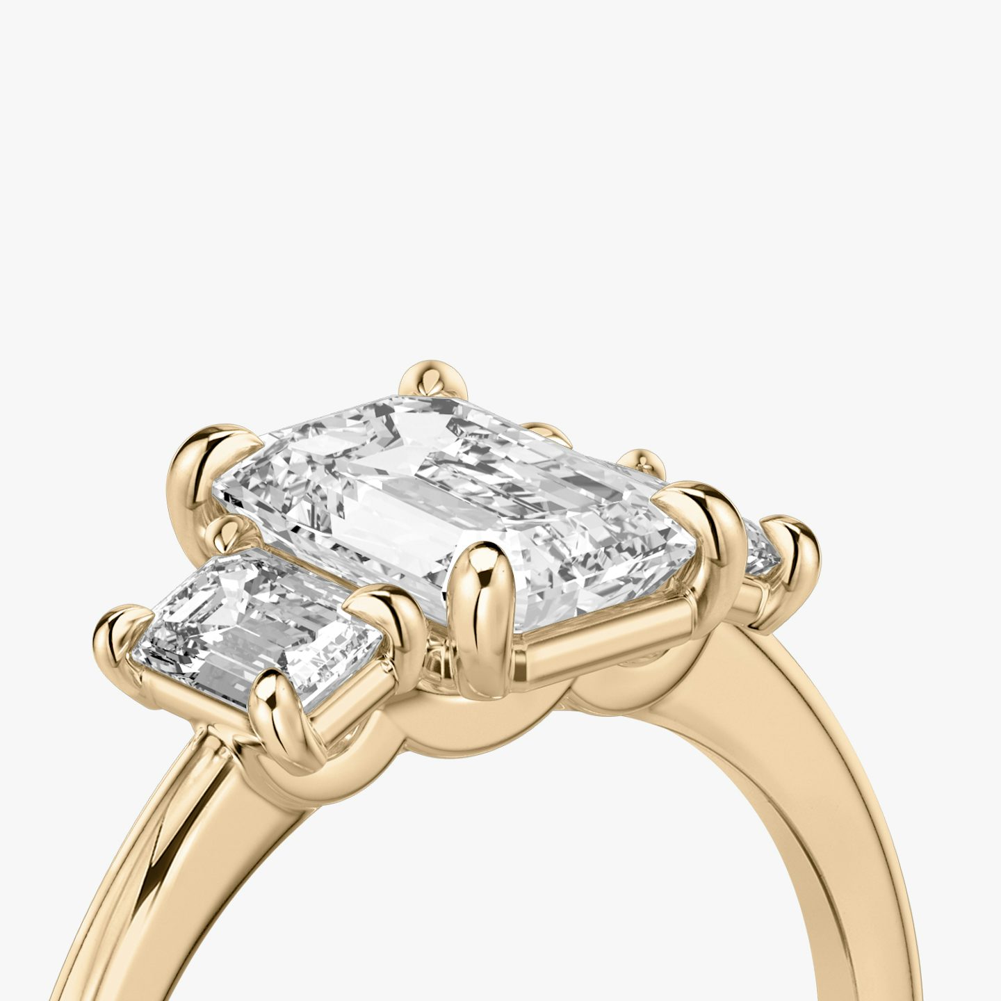 The Three Stone | Emerald | 14k | Rose Gold | bandAccent: Plain | sideStoneCarat: 0.25ct | sideStoneShape: Emerald | diamondOrientation: vertical | caratWeight: other